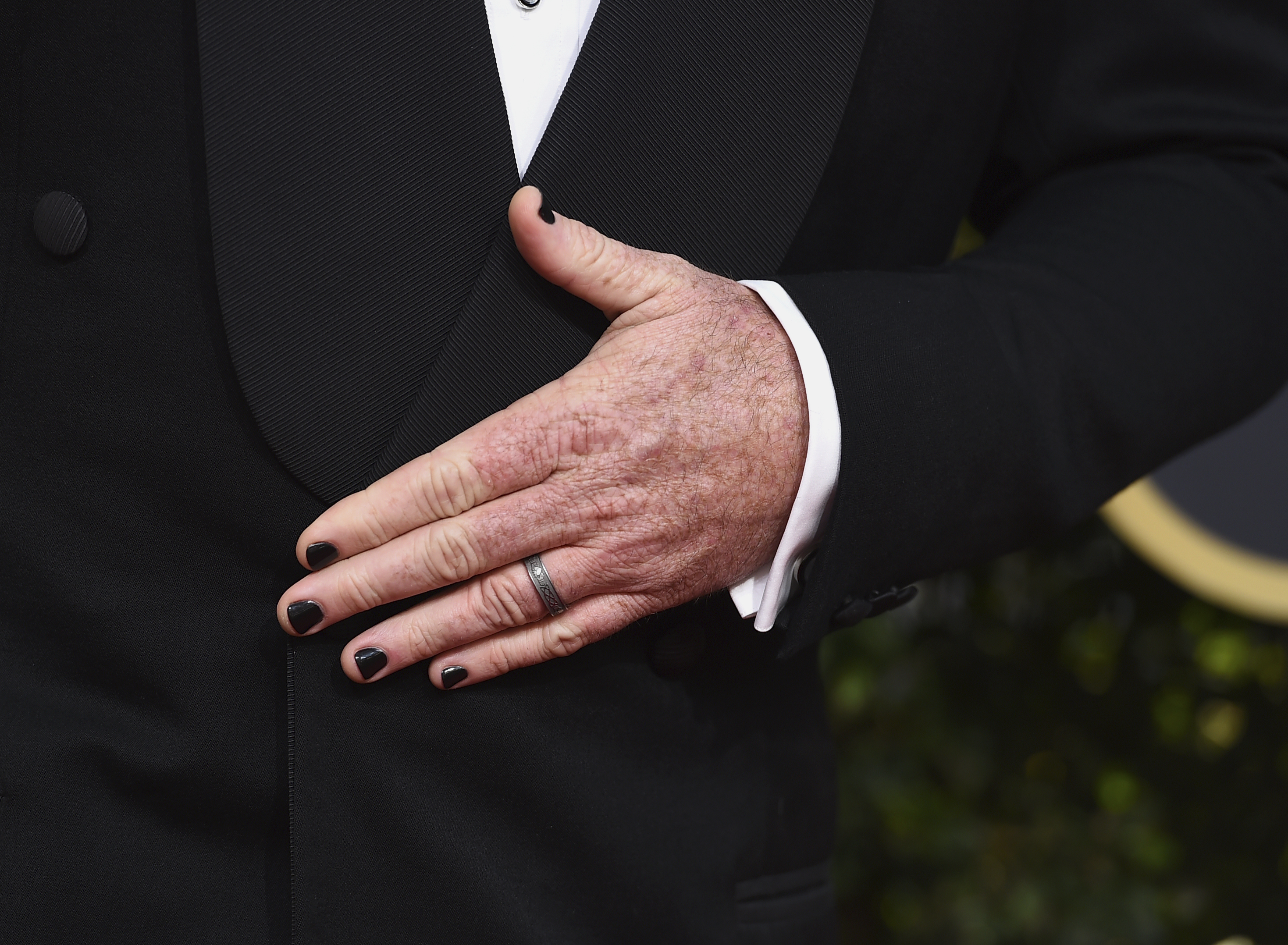 <div class="meta image-caption"><div class="origin-logo origin-image ap"><span>AP</span></div><span class="caption-text">Chris Sullivan wears black nail polish as he arrives at the 75th annual Golden Globe Awards at the Beverly Hilton Hotel on Sunday, Jan. 7, 2018, in Beverly Hills, Calif. (Jordan Strauss&#47;Invision&#47;AP)</span></div>