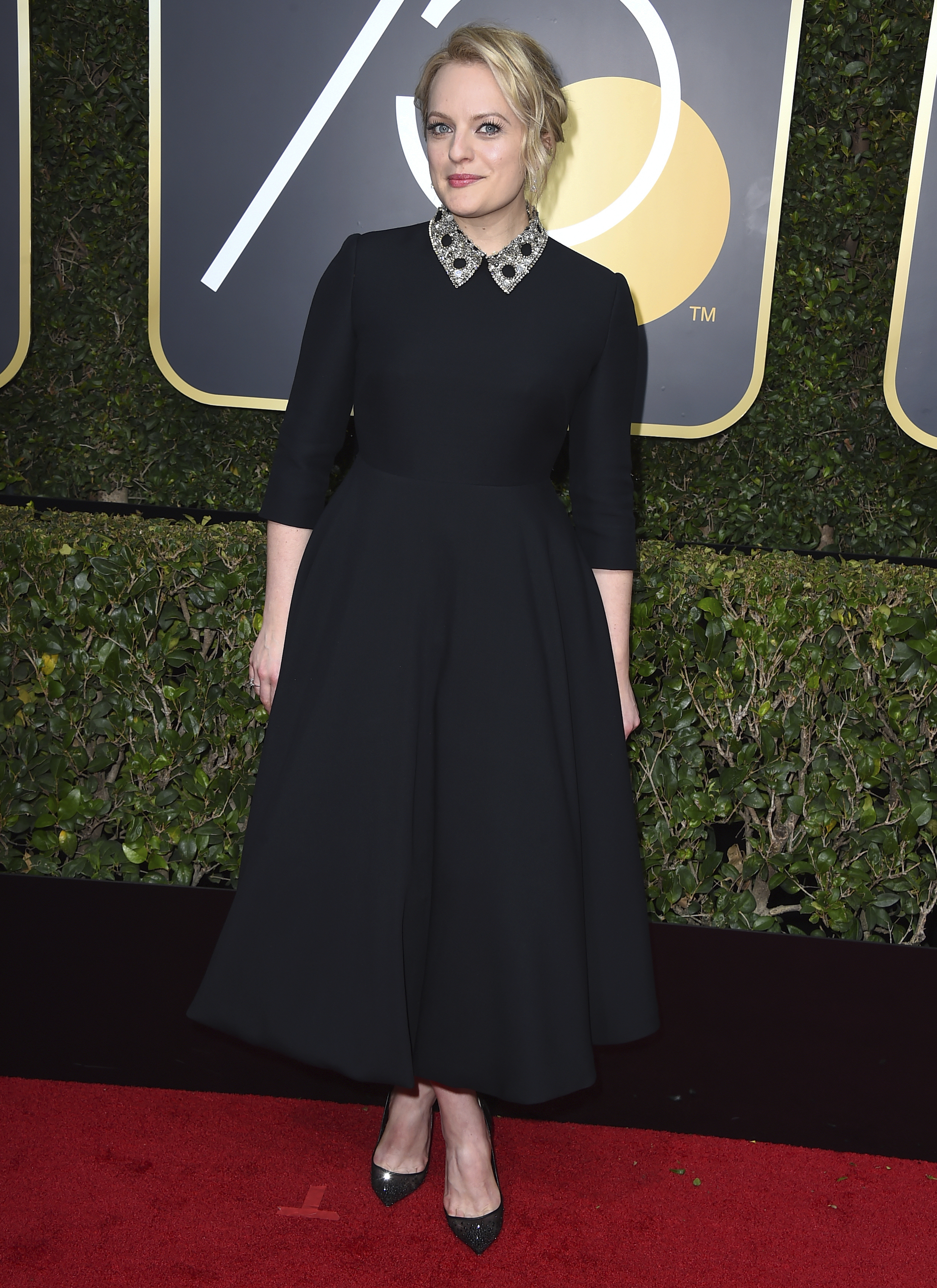 <div class="meta image-caption"><div class="origin-logo origin-image ap"><span>AP</span></div><span class="caption-text">Elisabeth Moss arrives at the 75th annual Golden Globe Awards at the Beverly Hilton Hotel on Sunday, Jan. 7, 2018, in Beverly Hills, Calif. (Jordan Strauss&#47;Invision&#47;AP)</span></div>