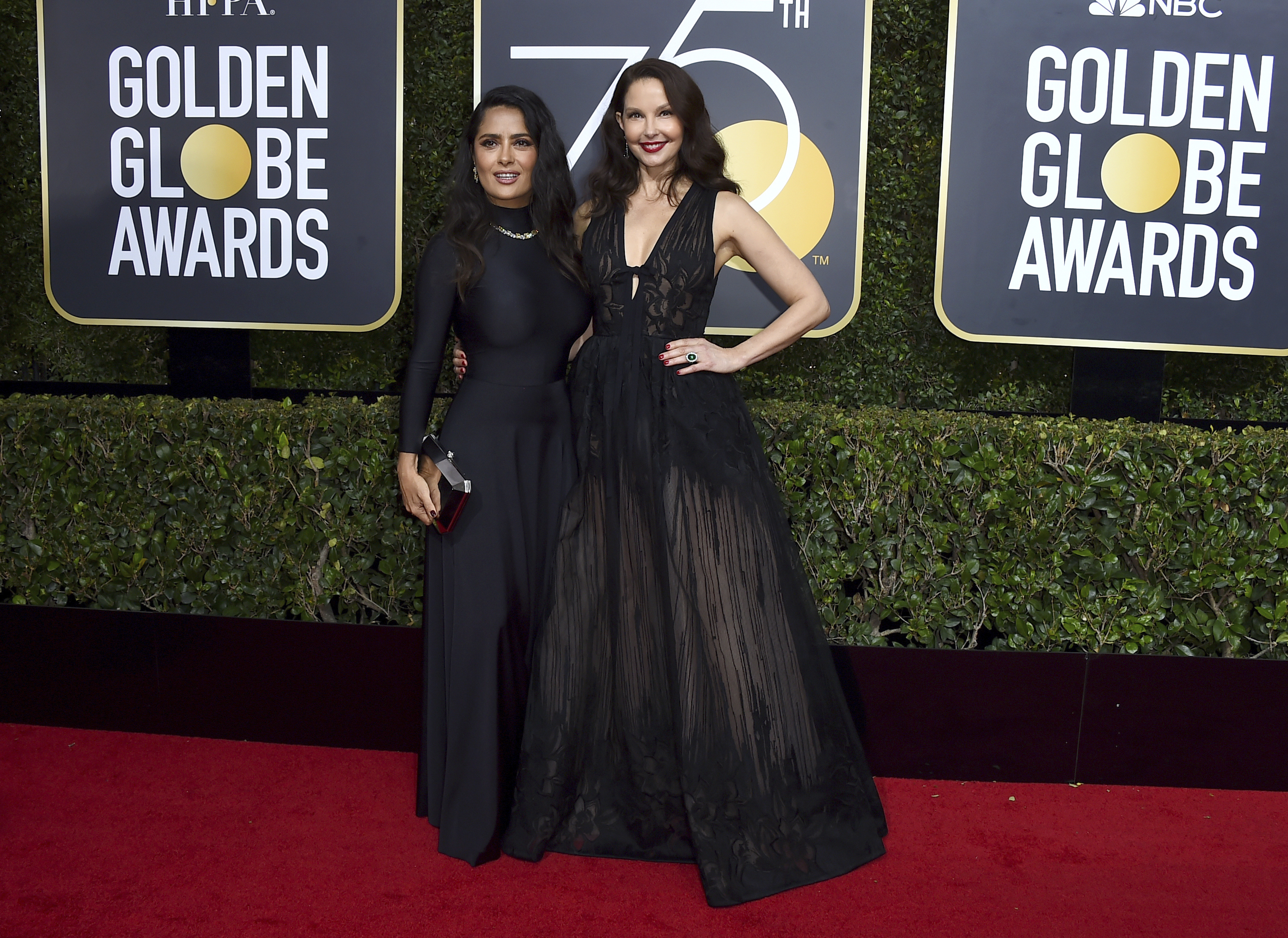 <div class="meta image-caption"><div class="origin-logo origin-image ap"><span>AP</span></div><span class="caption-text">Salma Hayek, left, and Ashley Judd arrive at the 75th annual Golden Globe Awards at the Beverly Hilton Hotel on Sunday, Jan. 7, 2018, in Beverly Hills, Calif. (Jordan Strauss&#47;Invision&#47;AP)</span></div>
