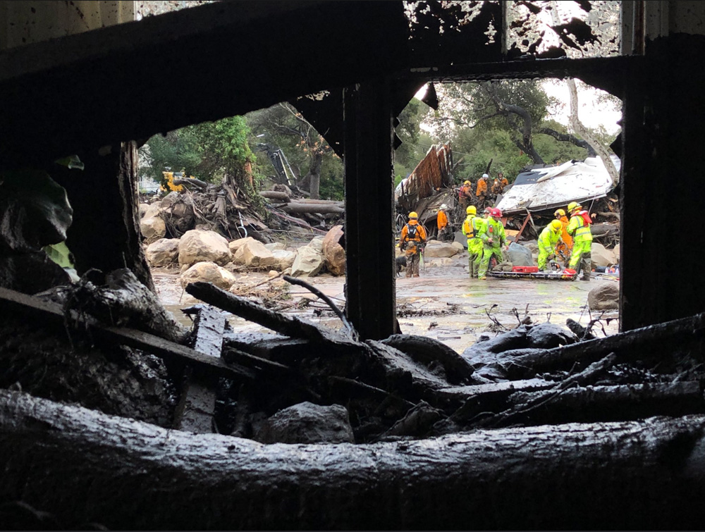 <div class='meta'><div class='origin-logo' data-origin='none'></div><span class='caption-text' data-credit='EliasonMike/Twitter'>"Scene from the 300 block of Hot Springs Road in Montecito following debris and mud flow due to heavy rain."</span></div>