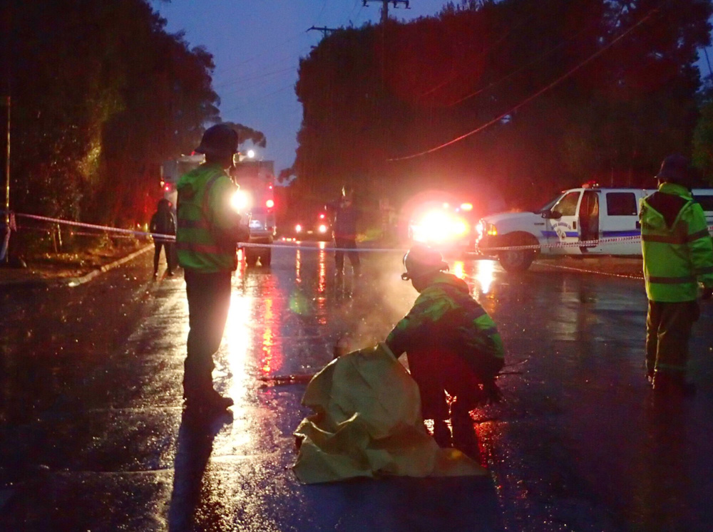 <div class='meta'><div class='origin-logo' data-origin='none'></div><span class='caption-text' data-credit='EliasonMike/Twitter'>"FF’s tend to a woman on Hot Springs Road while waiting for an ambulance.  The woman was pulled by FF’s from a debris pile in Montecito caused by heavy rain runoff."</span></div>