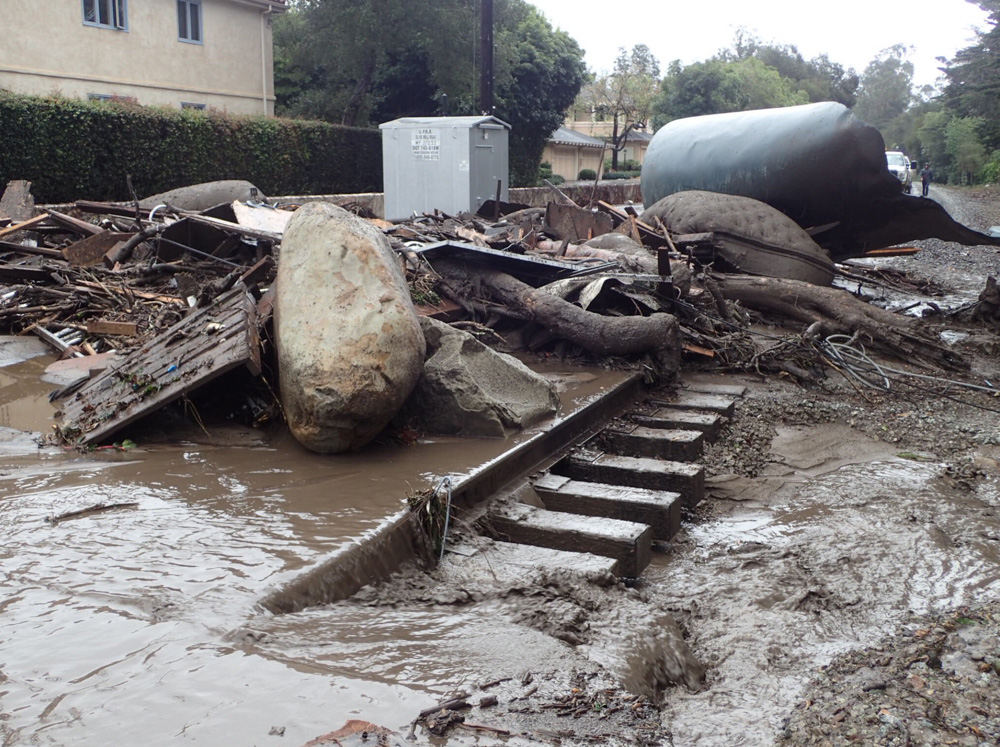 <div class='meta'><div class='origin-logo' data-origin='none'></div><span class='caption-text' data-credit='@EliasonMike/Twitter'>"The main line of the Union Pacific Railroad through Montecito is blocked with mudflow and debris due to heavy rains."</span></div>