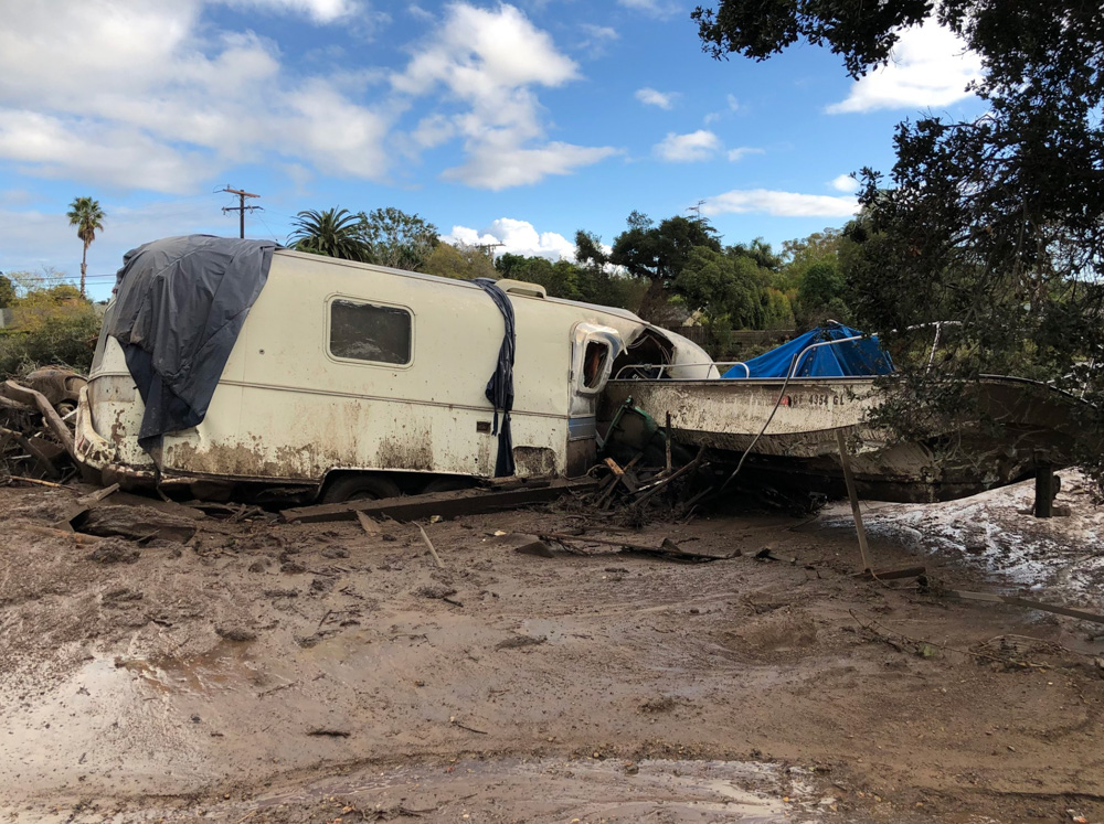 <div class='meta'><div class='origin-logo' data-origin='none'></div><span class='caption-text' data-credit='Santa Barbara County Fire'>"Damaged vehicles that were pushed by mudflow and onto the US 101 Freeway from nearby residential area in Montecito."</span></div>