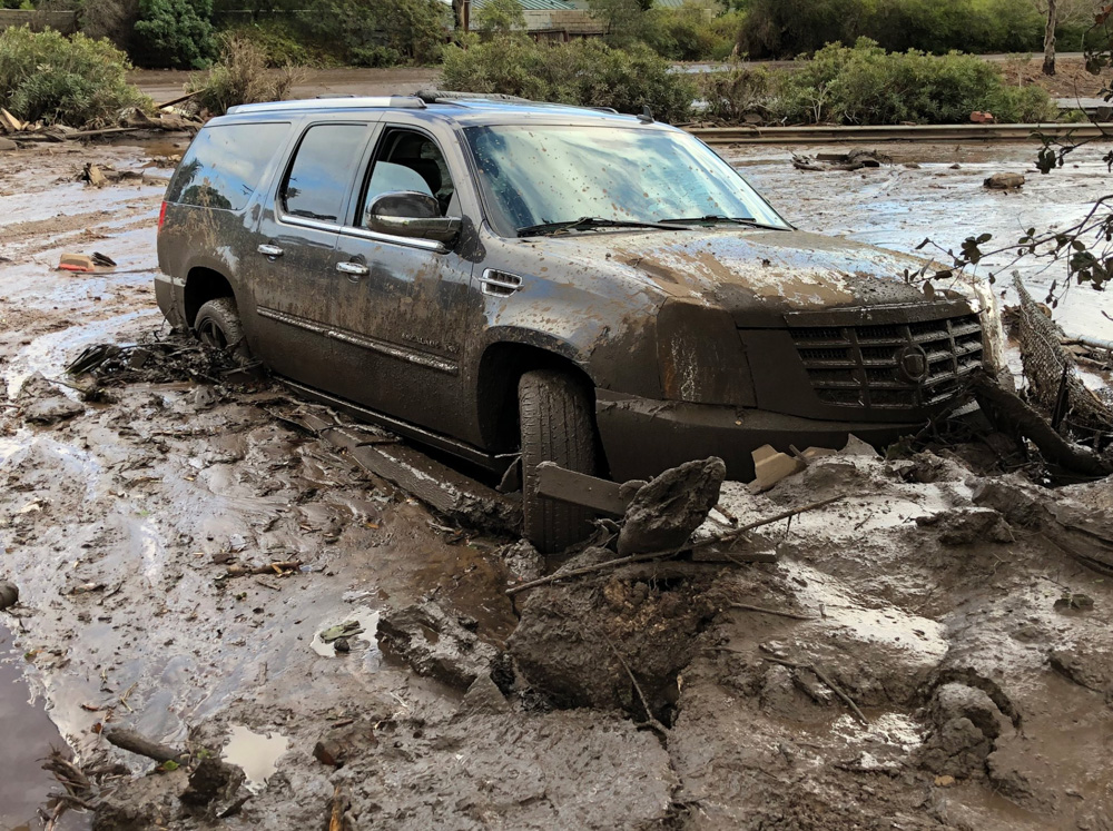 <div class='meta'><div class='origin-logo' data-origin='none'></div><span class='caption-text' data-credit='Santa Barbara County Fire'>"Damaged vehicles that were pushed by mudflow and onto the US 101 Freeway from nearby residential area in Montecito."</span></div>