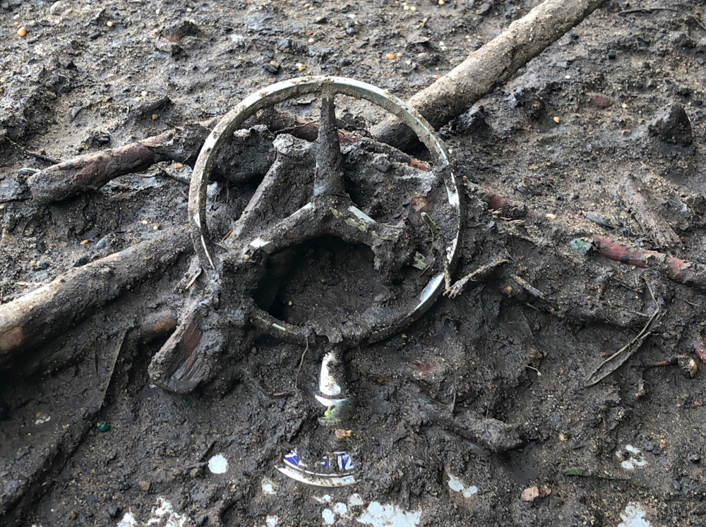 <div class='meta'><div class='origin-logo' data-origin='none'></div><span class='caption-text' data-credit='Santa Barbara County Fire'>"Detail of a Mercedes-Benz hood ornament that has been covered in runoff mud and debris. The vehicle was moved by flood waters and destroyed."</span></div>