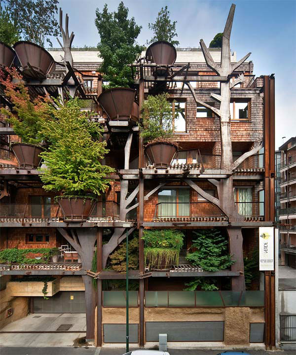<div class='meta'><div class='origin-logo' data-origin='none'></div><span class='caption-text' data-credit='Beppe Giardino'>These "treehouse" apartments in Turin, Italy are composed of 63 units, about 150 trees and fulfill your childhood dreams of living inside a massive tree.</span></div>