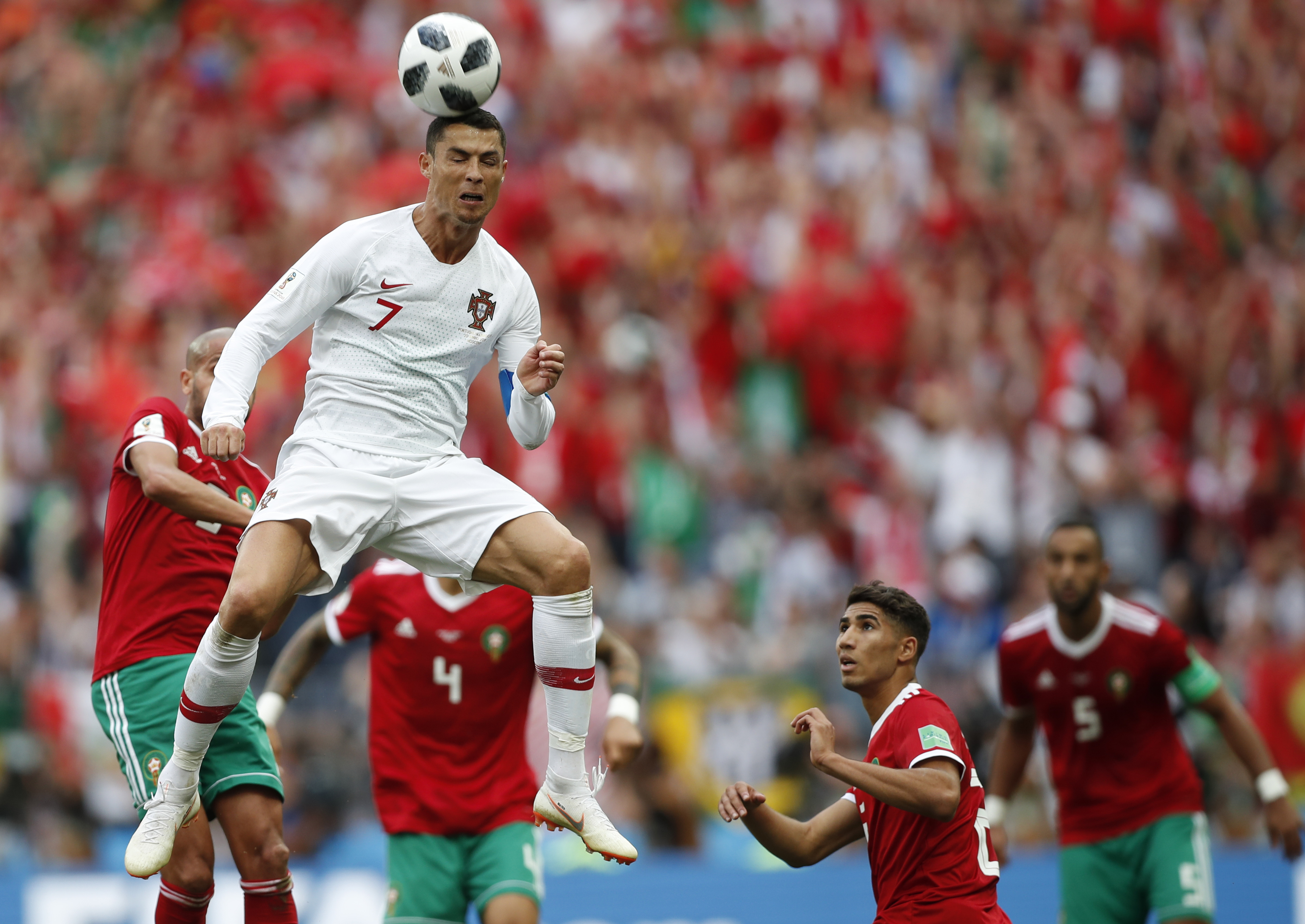<div class='meta'><div class='origin-logo' data-origin='none'></div><span class='caption-text' data-credit='Francisco Seco/AP Photo'>Portugal's Cristiano Ronaldo leaps up for a header during the group B match against Morocco in the Luzhniki Stadium in Moscow, Russia, Wednesday, June 20, 2018.</span></div>