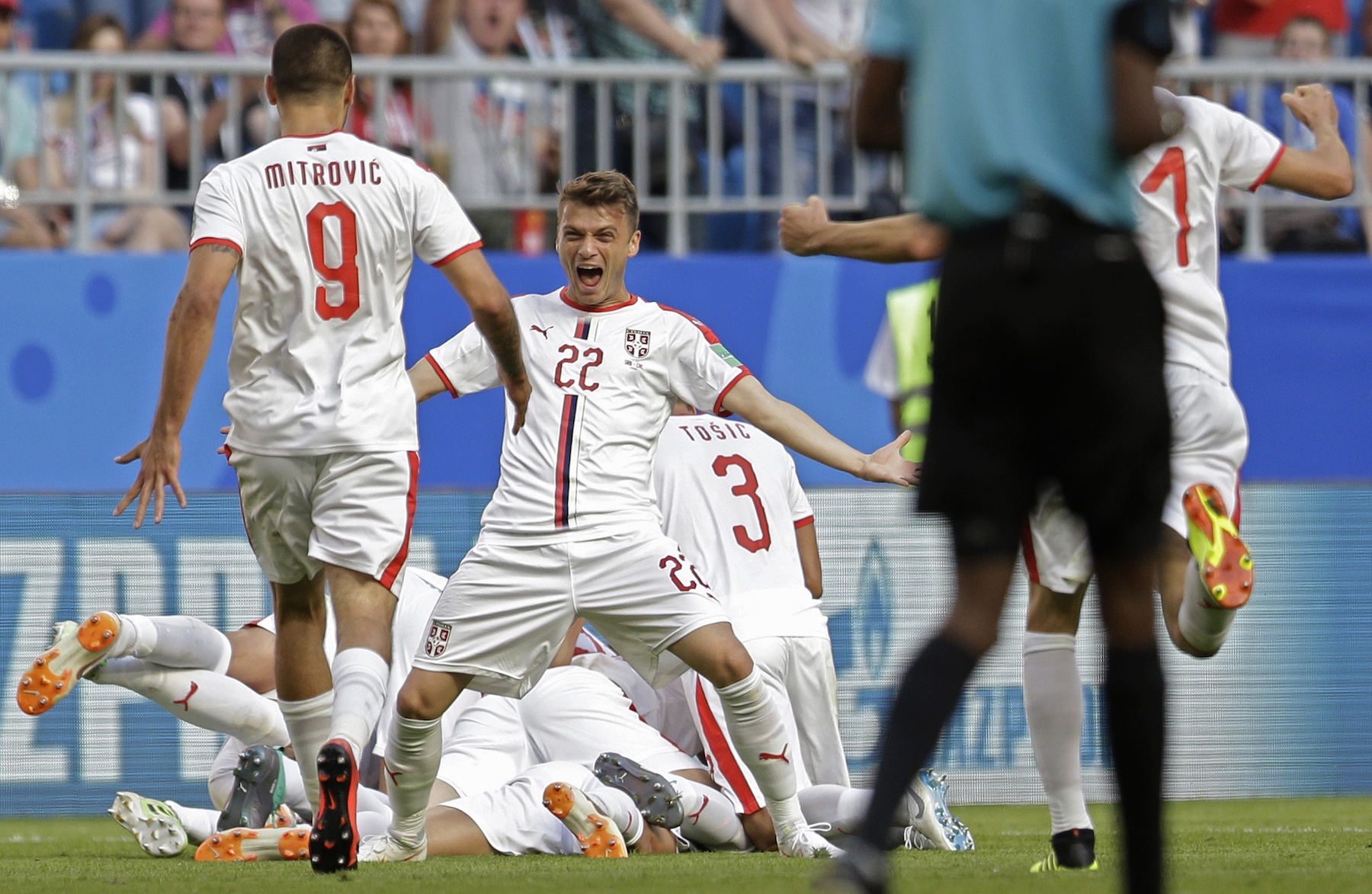<div class='meta'><div class='origin-logo' data-origin='AP'></div><span class='caption-text' data-credit='AP Photo/Natacha Pisarenko'>Serbia's Adem Ljajic, centre, celebrates after teammate Aleksandar Kolarov scored the opening goal during the group E match between Costa Rica and Serbia.</span></div>