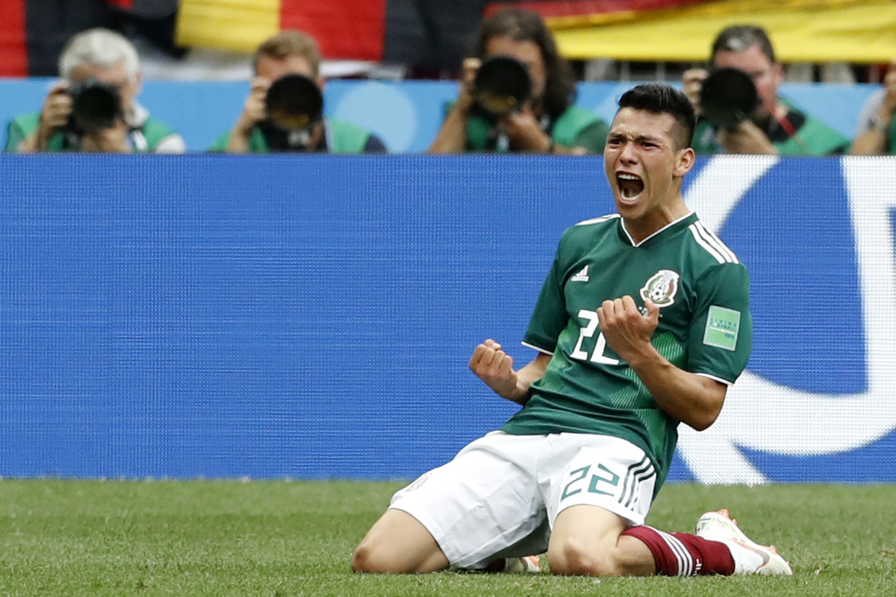 <div class='meta'><div class='origin-logo' data-origin='AP'></div><span class='caption-text' data-credit='AP Photo/Antonio Calanni'>Mexico's Hirving Lozano, celebrates scoring his side's opening goal during the group F match between Germany and Mexico at the 2018 soccer World Cup in the Luzhniki Stadium.</span></div>
