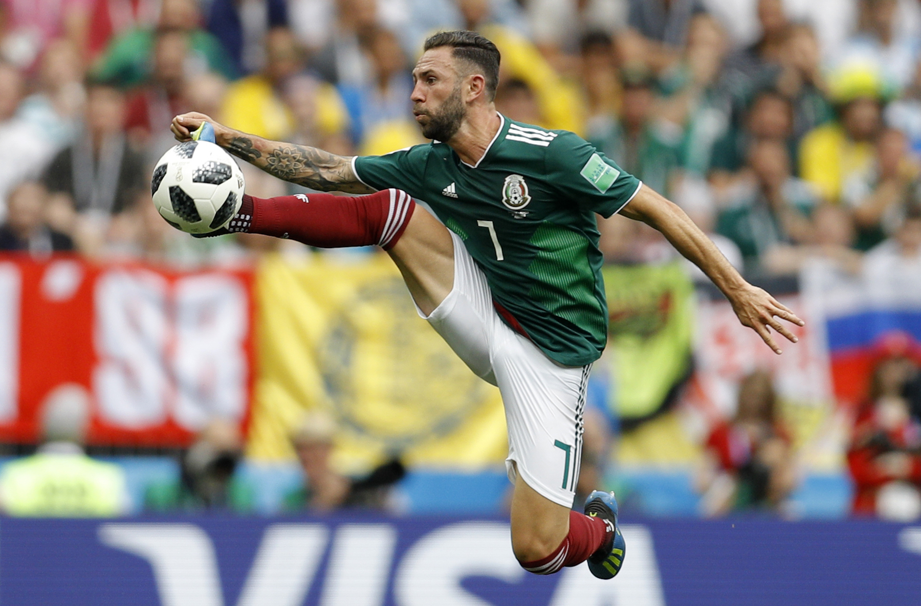 <div class='meta'><div class='origin-logo' data-origin='AP'></div><span class='caption-text' data-credit='AP Photo/Victor R. Caivano'>Mexico's Miguel Layun controls the ball during the group F match between Germany and Mexico at the 2018 soccer World Cup in the Luzhniki Stadium.</span></div>