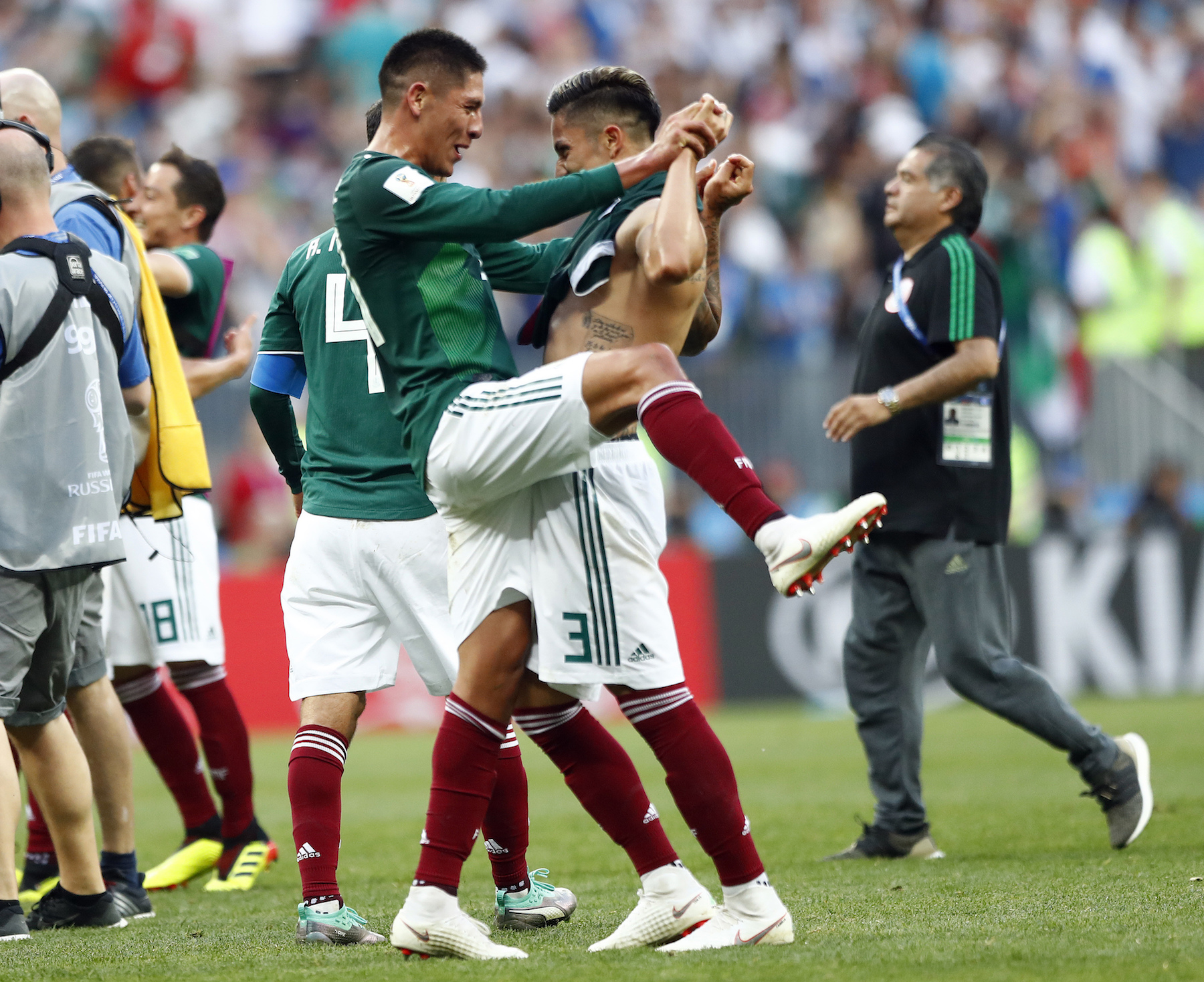 <div class='meta'><div class='origin-logo' data-origin='AP'></div><span class='caption-text' data-credit='AP Photo/Matthias Schrader'>Mexico players celebrate after winning the group F match between Germany and Mexico at the 2018 soccer World Cup in the Luzhniki Stadium in Moscow, Russia.</span></div>