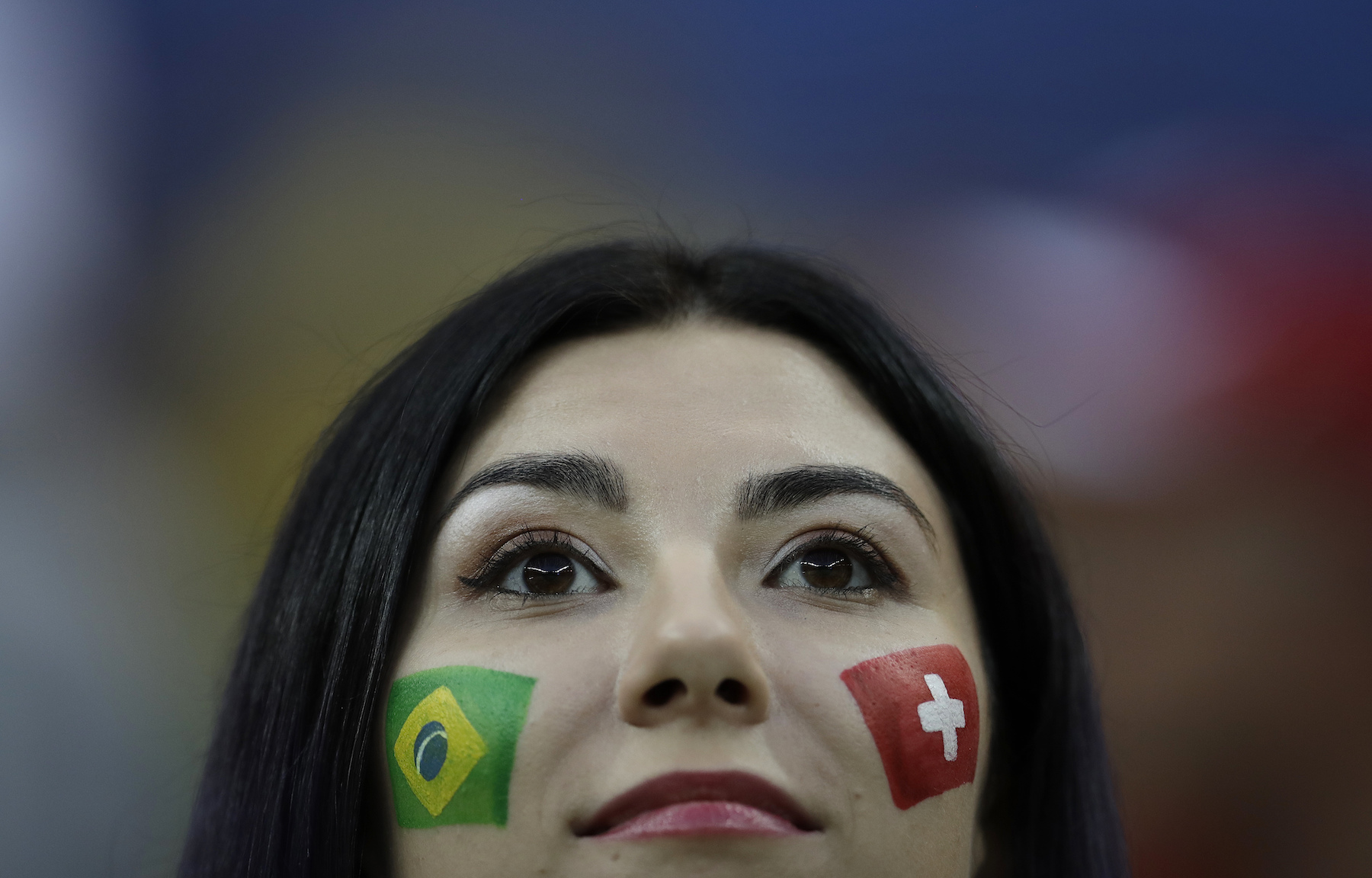 <div class='meta'><div class='origin-logo' data-origin='AP'></div><span class='caption-text' data-credit='AP Photo/Felipe Dana'>A soccer supporter show flags painted on her cheeks during the group E match between Brazil and Switzerland at the 2018 soccer World Cup in the Rostov Arena.</span></div>