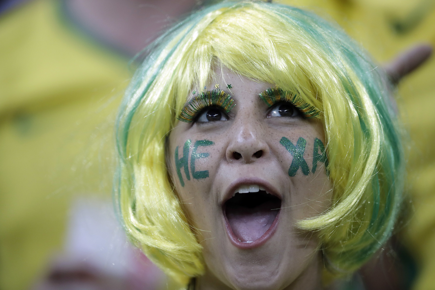 <div class='meta'><div class='origin-logo' data-origin='AP'></div><span class='caption-text' data-credit='AP Photo/Felipe Dana'>A soccer fan cheers ahead of the group E match between Brazil and Switzerland at the 2018 soccer World Cup in the Rostov Arena in Rostov-on-Don, Russia, Sunday, June 17, 2018.</span></div>