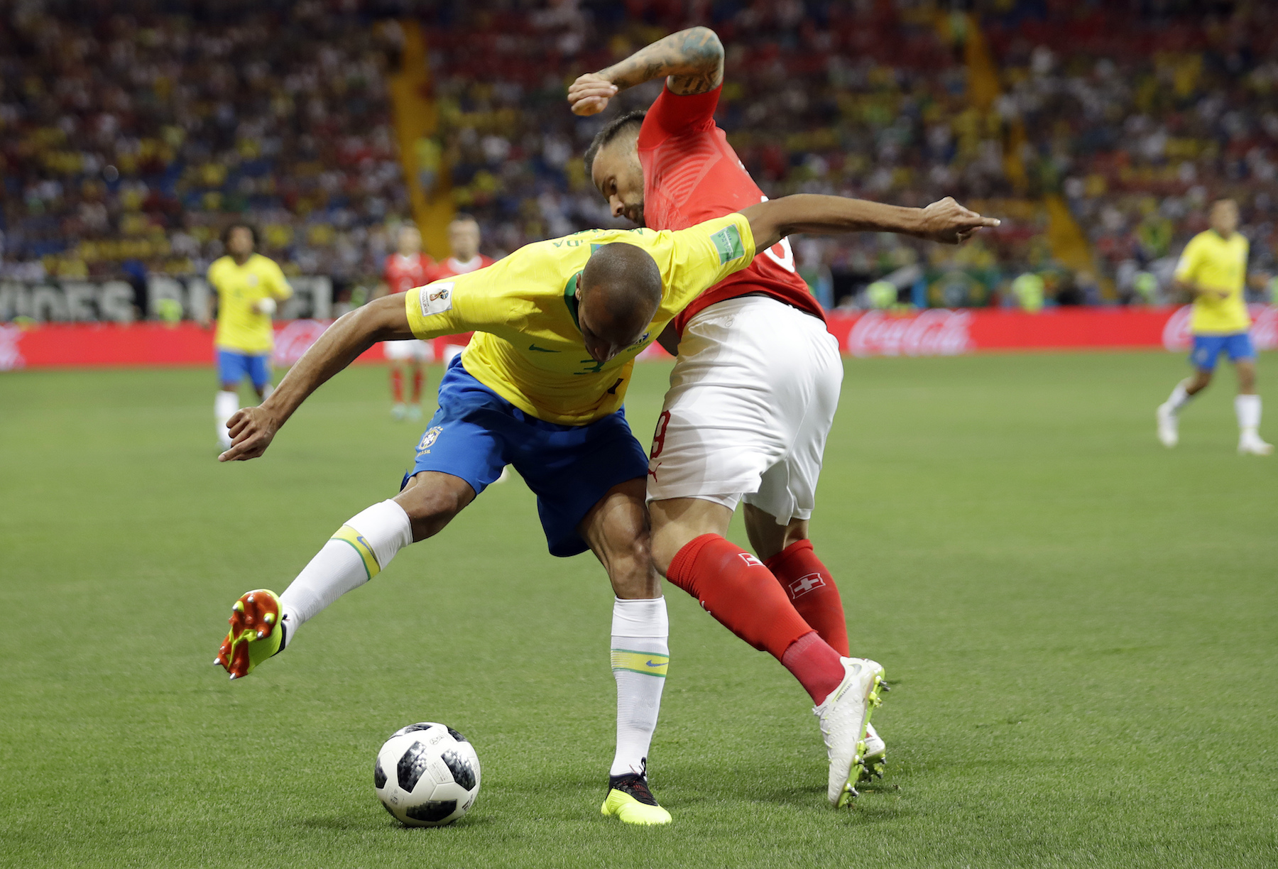 <div class='meta'><div class='origin-logo' data-origin='AP'></div><span class='caption-text' data-credit='AP Photo/Felipe Dana'>Brazil's Miranda, left, and Switzerland's Haris Seferovic challenge for the ball during the group E match between Brazil and Switzerland.</span></div>