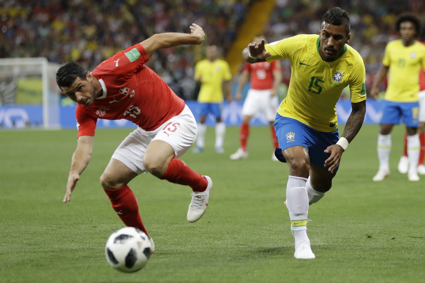 <div class='meta'><div class='origin-logo' data-origin='AP'></div><span class='caption-text' data-credit='AP Photo/Andre Penner'>Switzerland's Blerim Dzemaili, left, and Brazil's Paulinho eye the during their group E match at the 2018 soccer World Cup in the Rostov Arena in Rostov-on-Don, Russia.</span></div>