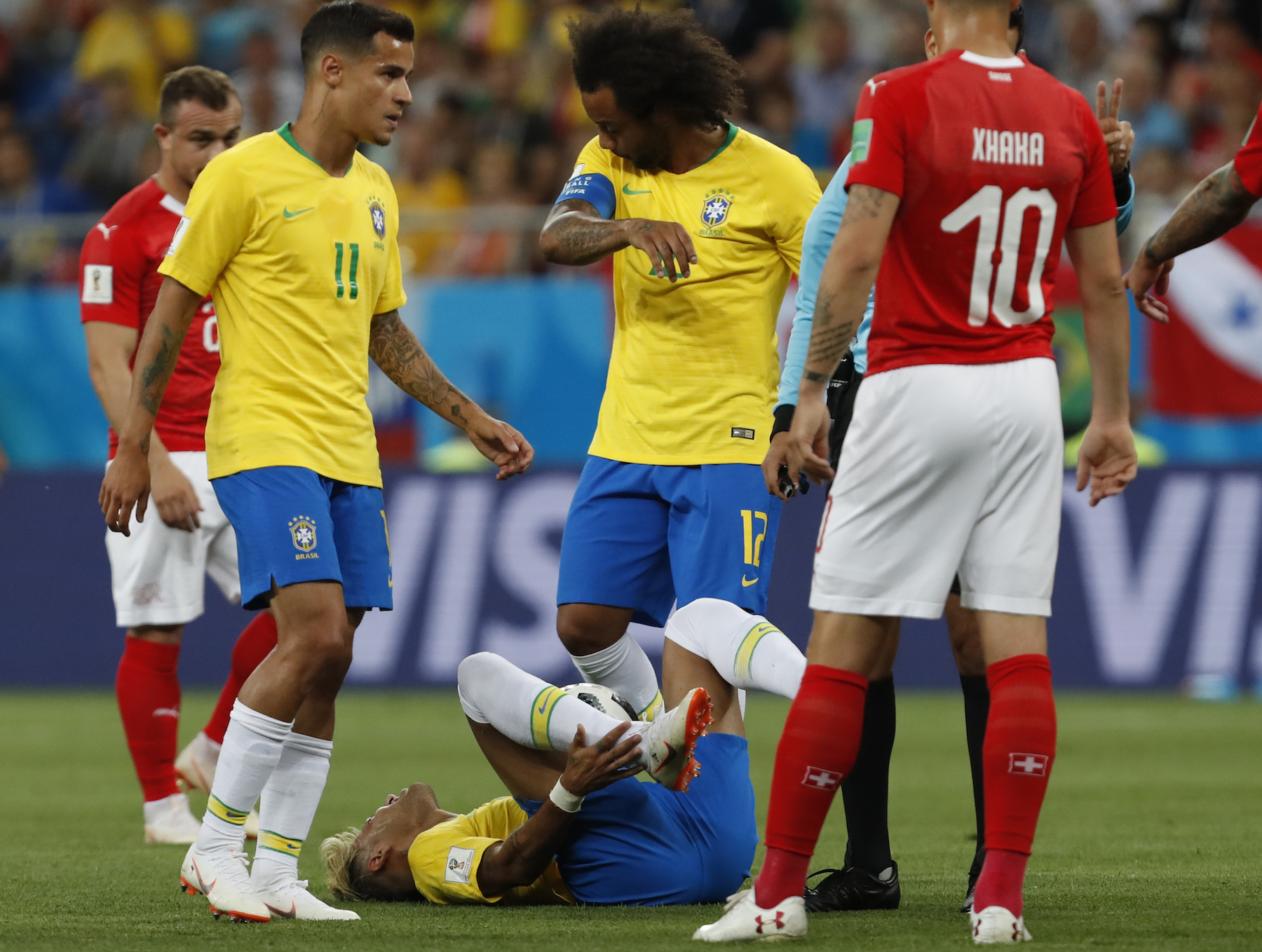 <div class='meta'><div class='origin-logo' data-origin='AP'></div><span class='caption-text' data-credit='AP Photo/Darko Vojinovic'>Brazil's Neymar lies on the ground during the group E match between Brazil and Switzerland at the 2018 soccer World Cup in the Rostov Arena in Rostov-on-Don, Russia.</span></div>