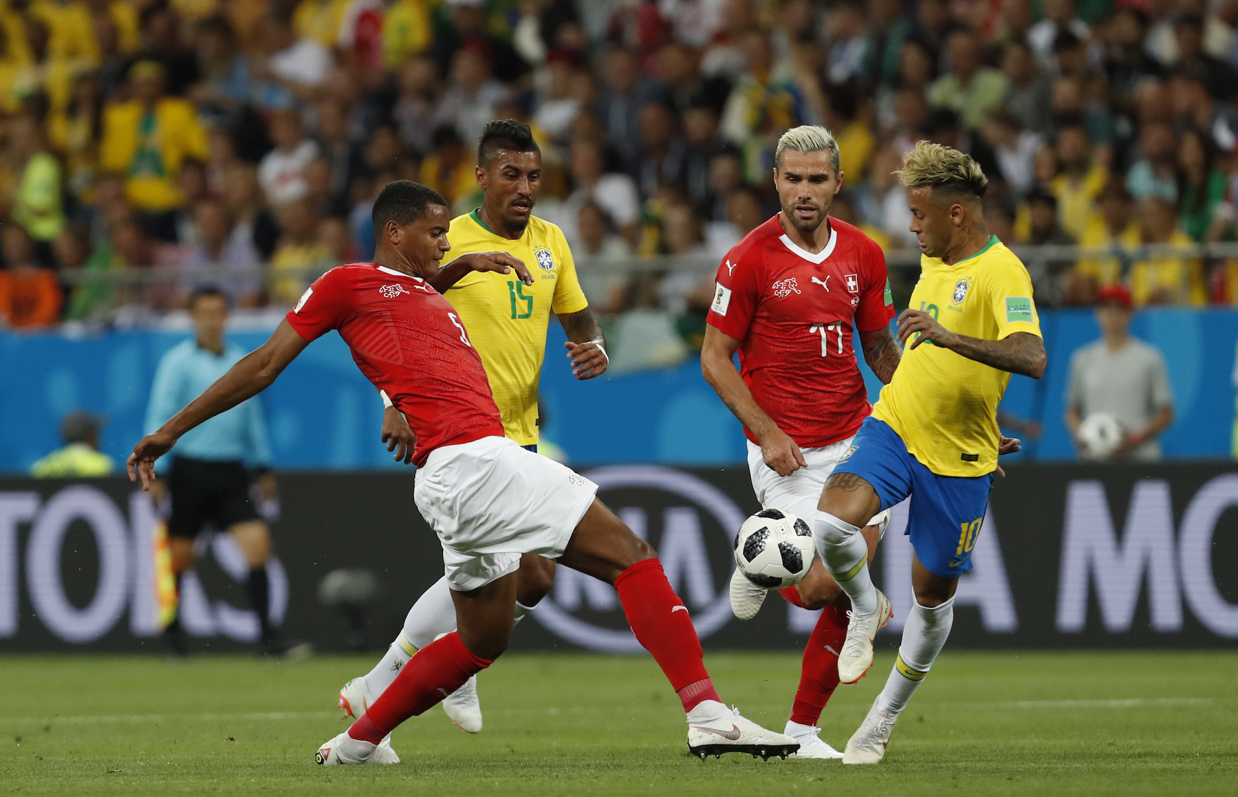 <div class='meta'><div class='origin-logo' data-origin='AP'></div><span class='caption-text' data-credit='AP Photo/Darko Vojinovic'>Brazil's Neymar, right, duels for the ball with Switzerland's Manuel Akanji during the group E match between Brazil and Switzerland at the 2018 soccer World Cup.</span></div>