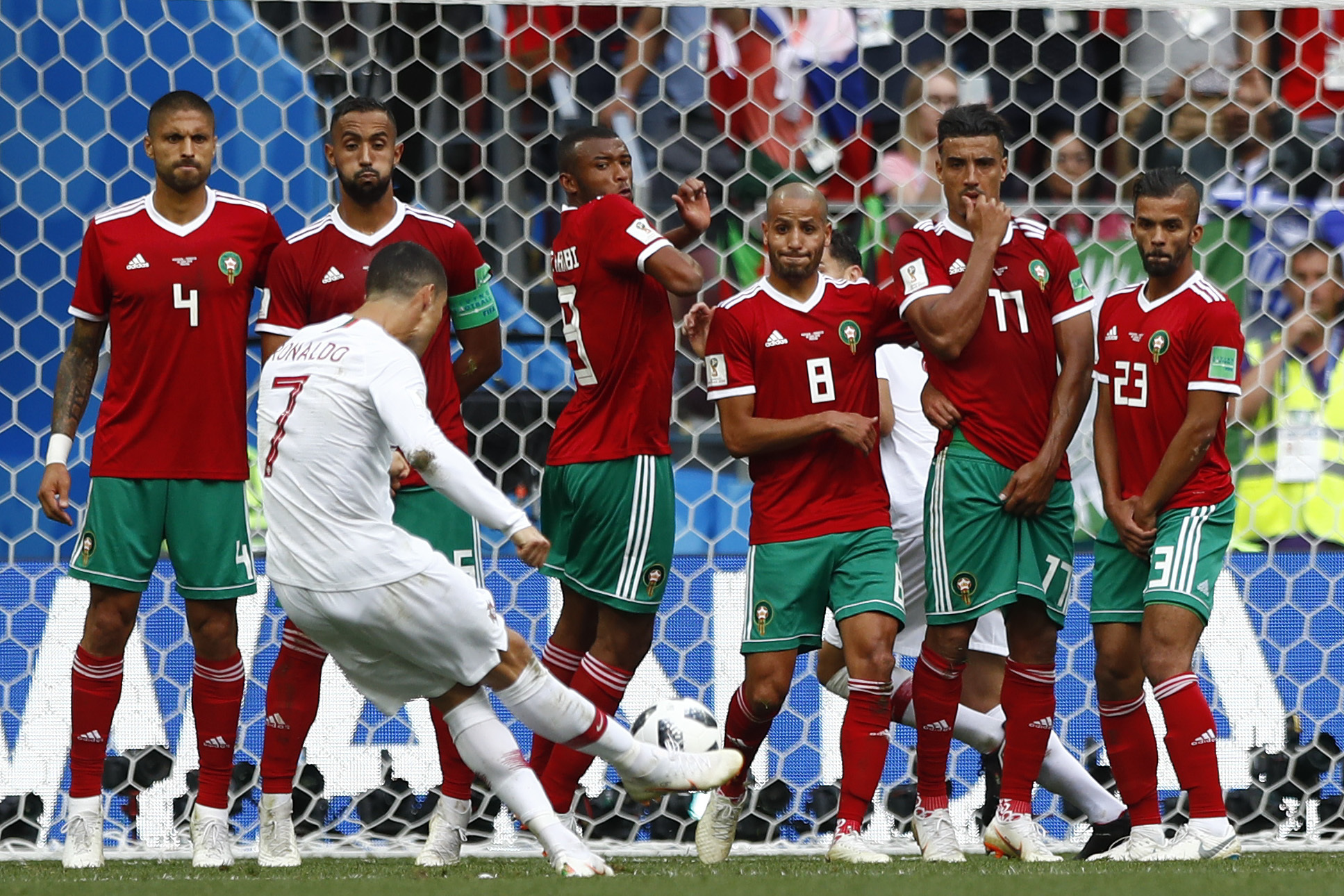 <div class='meta'><div class='origin-logo' data-origin='none'></div><span class='caption-text' data-credit='Matthias Schrader/AP Photo'>Portugal's Cristiano Ronaldo takes a free kick during the group B match between Portugal and Morocco  in the Luzhniki Stadium in Moscow, Russia, Wednesday, June 20, 2018.</span></div>