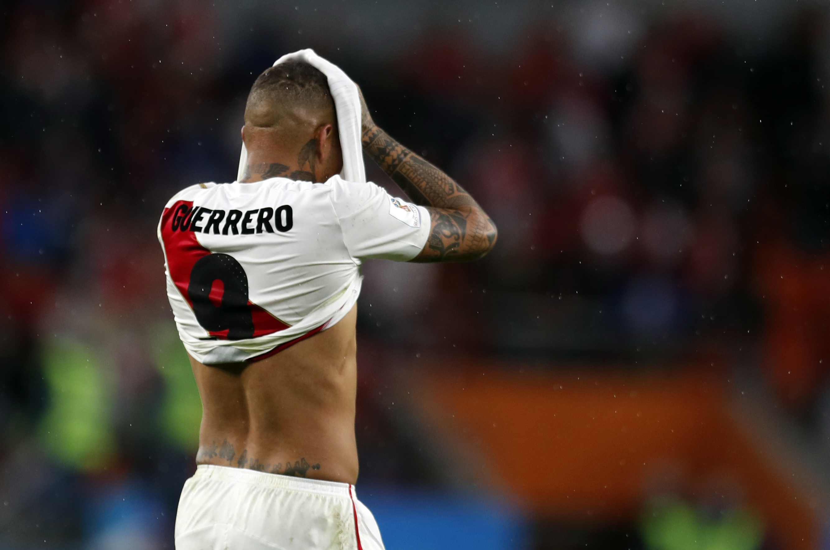<div class='meta'><div class='origin-logo' data-origin='none'></div><span class='caption-text' data-credit='Natacha Pisarenko/AP Photo'>Peru's Paolo Guerrero covers his face in dejection at the end of the group C match between France and Peru on Thursday, June 21, 2018.</span></div>
