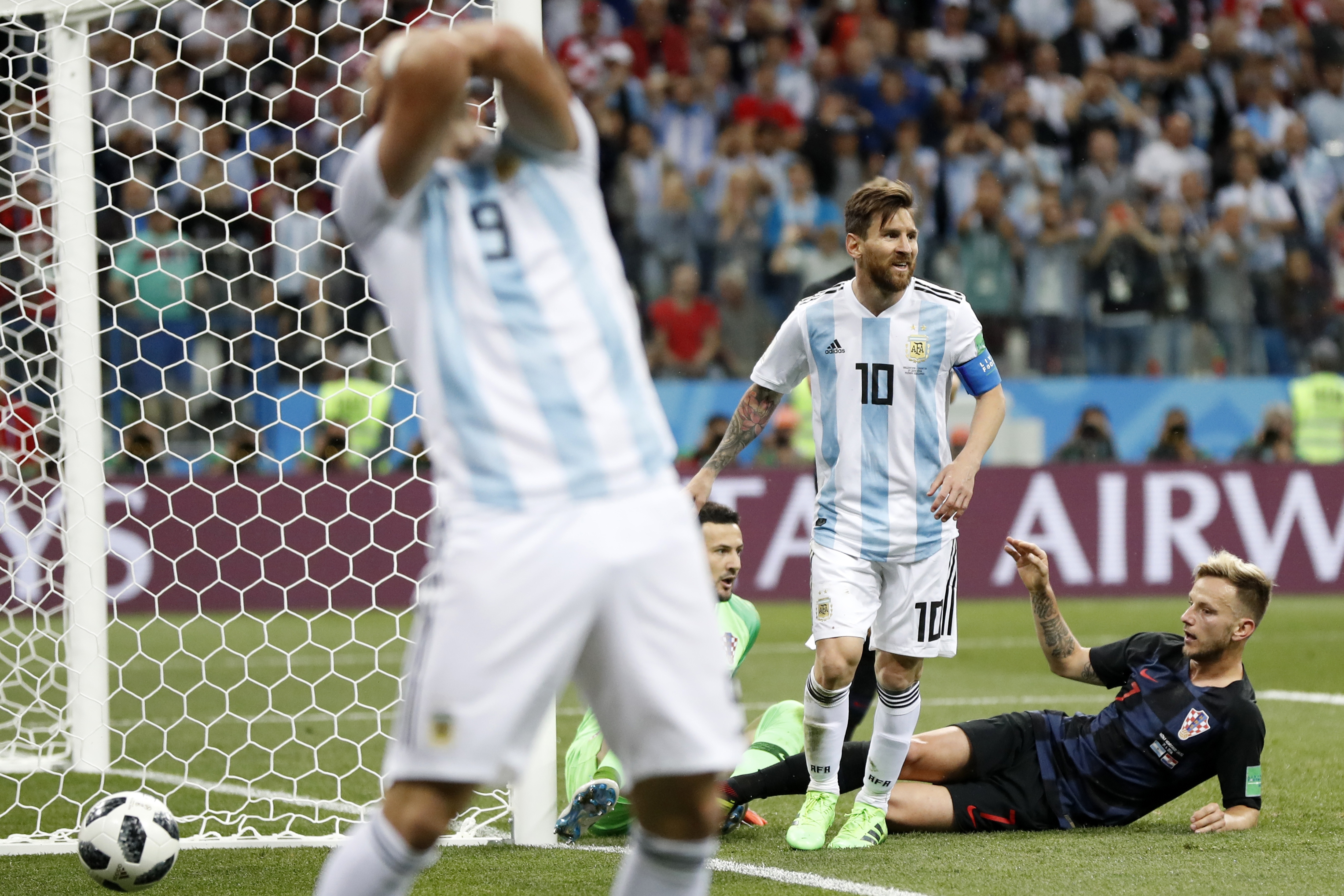 <div class='meta'><div class='origin-logo' data-origin='none'></div><span class='caption-text' data-credit='Petr David Josek/AP Photo'>Argentina's Lionel Messi, center, reacts after missing to score during the group D match between Argentina and Croatia in Nizhny Novgorod Stadium on June 21.</span></div>