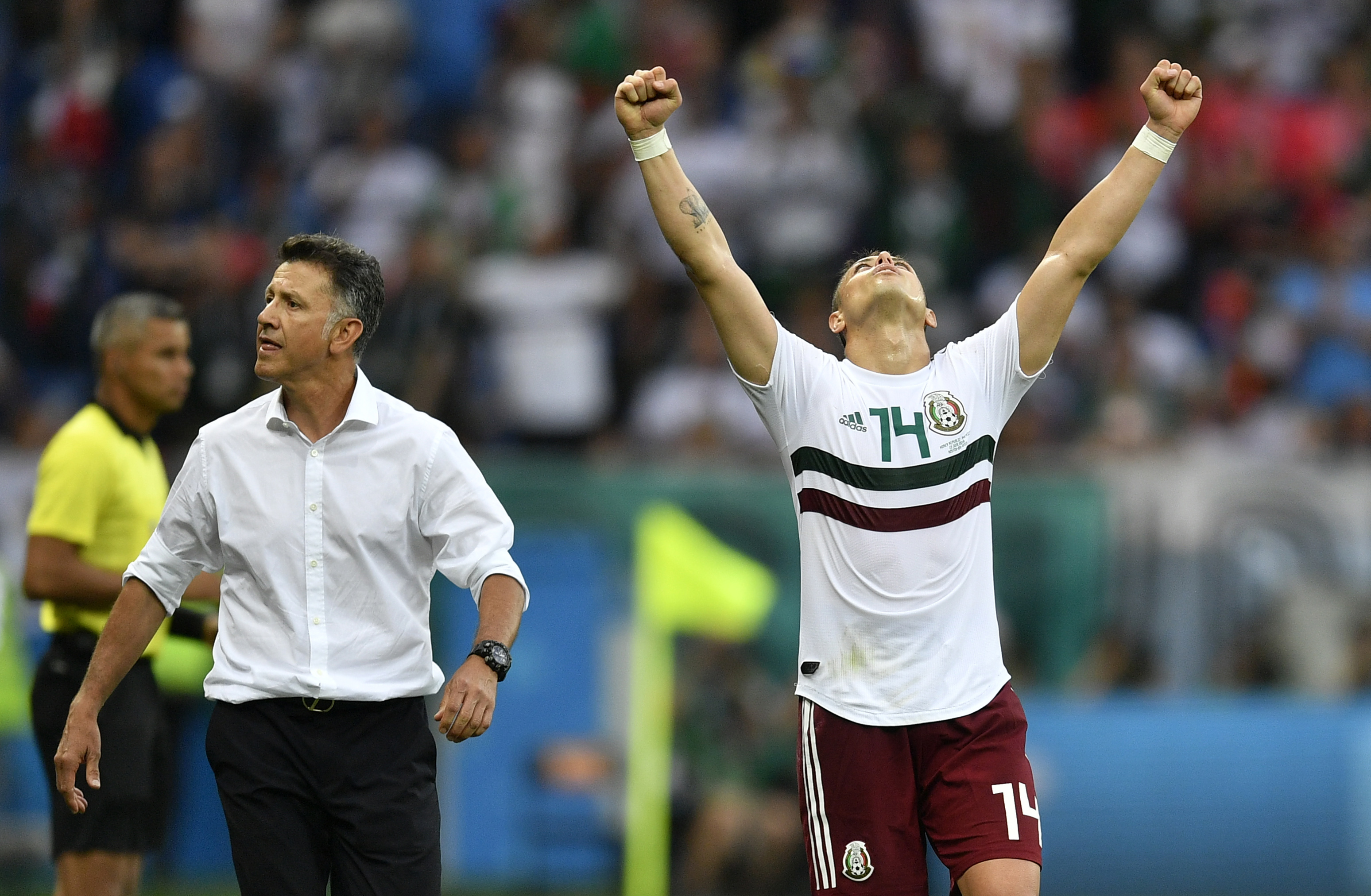 <div class='meta'><div class='origin-logo' data-origin='none'></div><span class='caption-text' data-credit='Martin Meissner/AP Photo'>Mexico's Javier Hernandez celebrates beside Mexico head coach Juan Carlos Osorio at the end of the group F match between Mexico and South Korea in the Rostov Arena on June 23.</span></div>