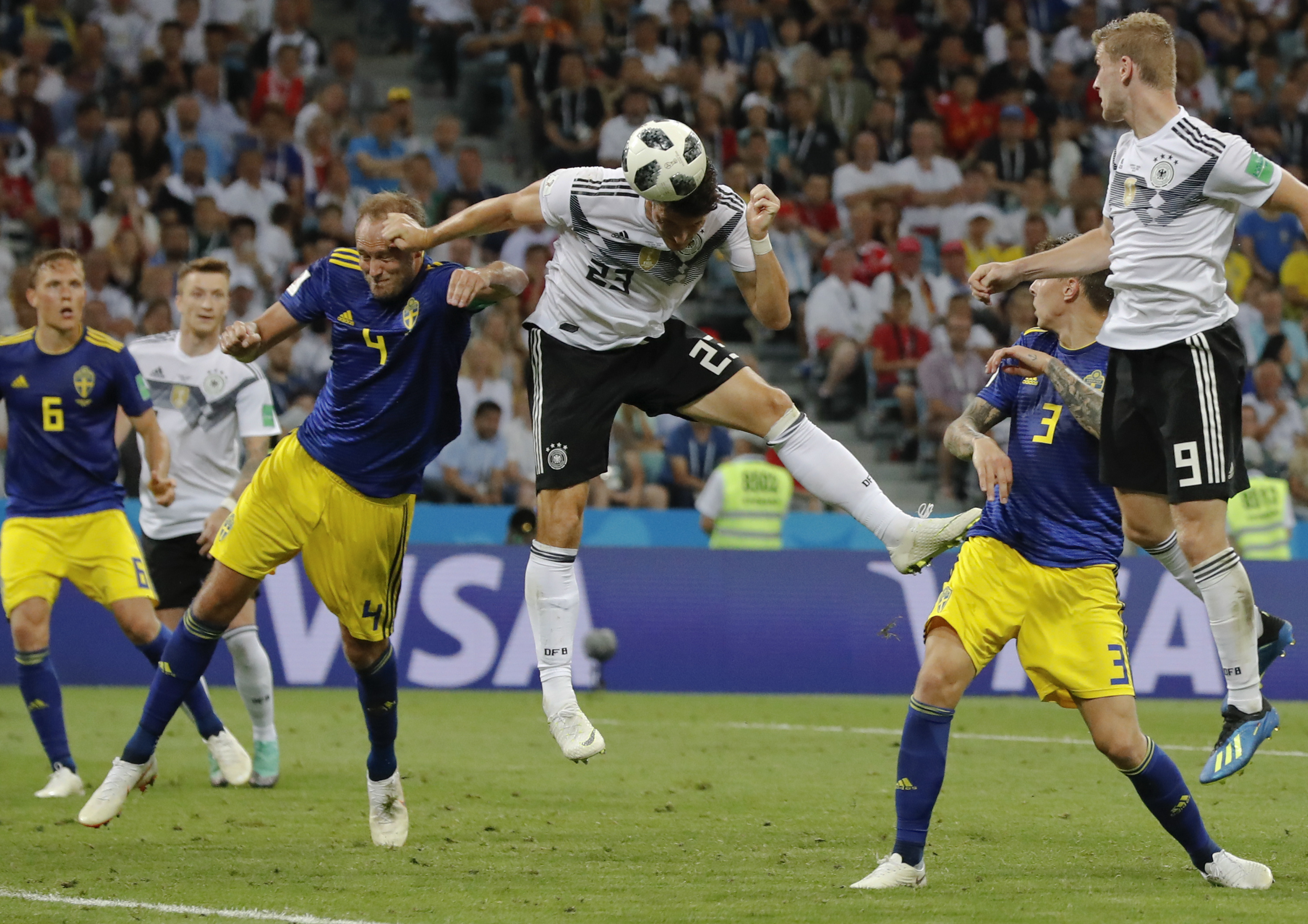 <div class='meta'><div class='origin-logo' data-origin='none'></div><span class='caption-text' data-credit='Frank Augstein/AP Photo'>Germany's Mario Gomez, center, heads the ball during the group F match between Germany and Sweden in the Fisht Stadium in Sochi, Russia, Saturday, June 23, 2018.</span></div>