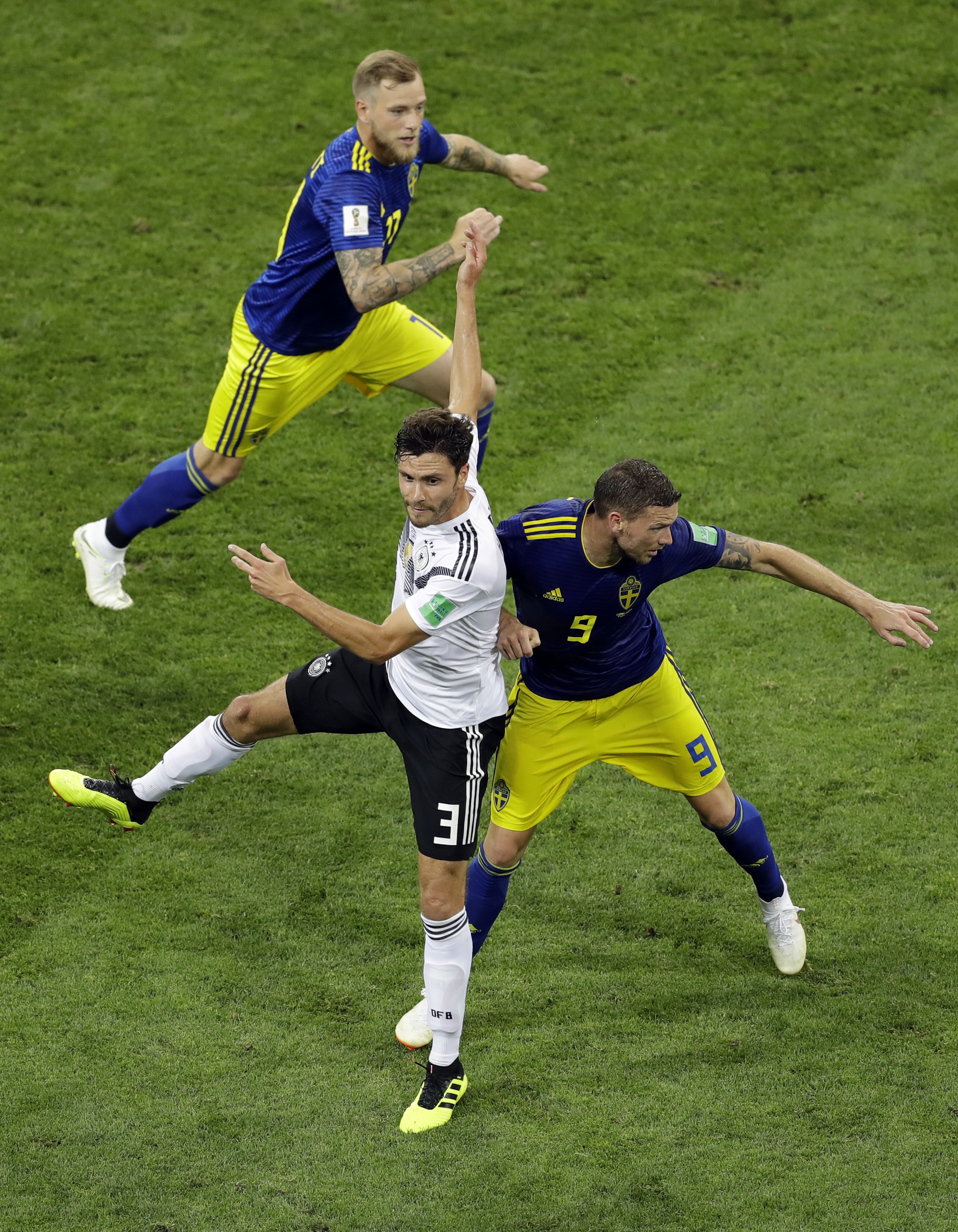<div class='meta'><div class='origin-logo' data-origin='none'></div><span class='caption-text' data-credit='Sergei Grits/AP Photo'>Germany's Jonas Hector, left, collides with Sweden's Marcus Berg during the group F match in the Fisht Stadium in Sochi, Russia, Saturday, June 23, 2018.</span></div>