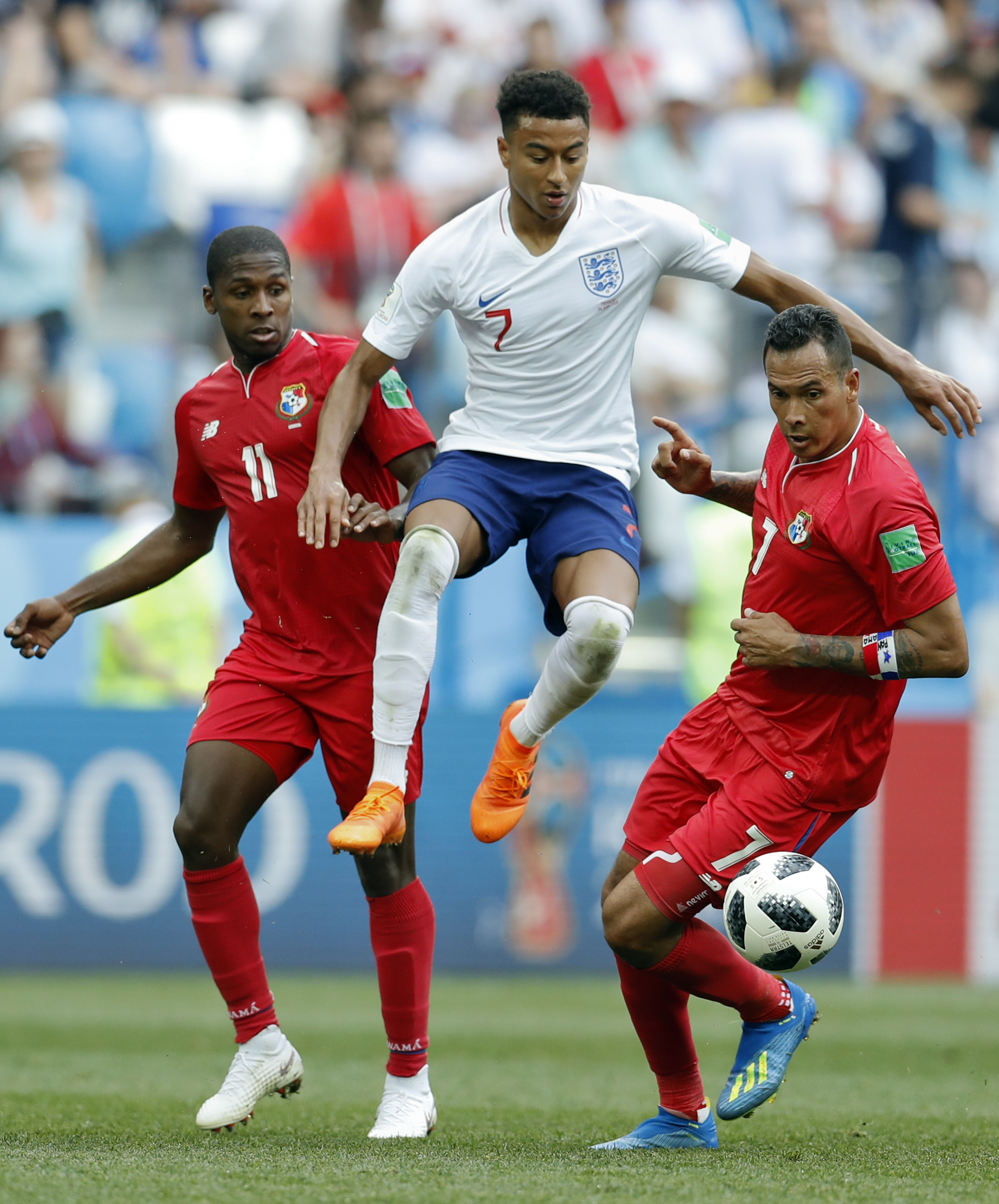 <div class='meta'><div class='origin-logo' data-origin='none'></div><span class='caption-text' data-credit='Antonio Calanni/AP Photo'>England's Jesse Lingard makes his way between Panama's Armando Cooper, left, and Panama's Blas Perez during the group G match at the Nizhny Novgorod Stadium in Russia on June 24.</span></div>