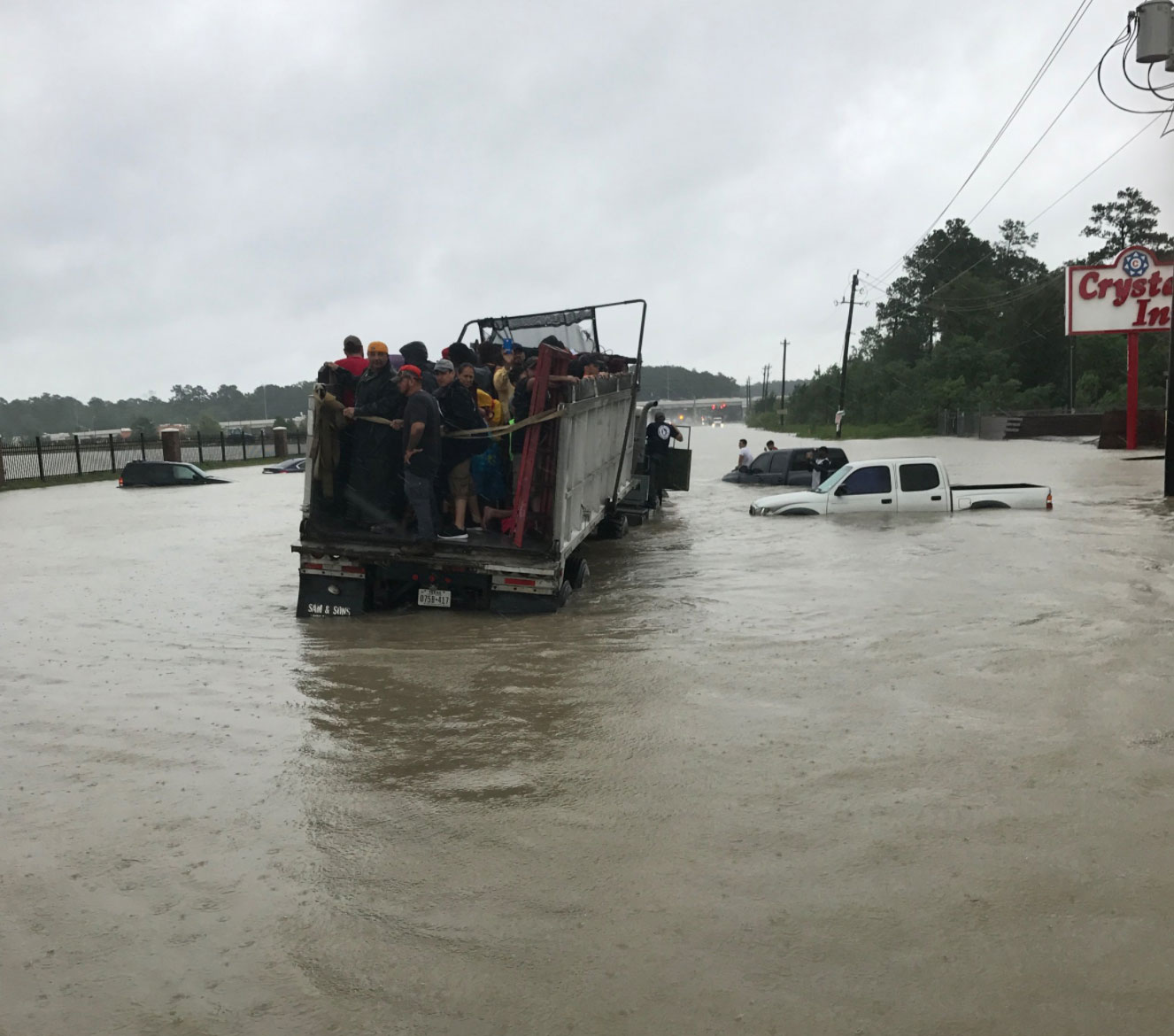 <div class='meta'><div class='origin-logo' data-origin='none'></div><span class='caption-text' data-credit='SheriffEd_HCSO/Twitter'>The Harris County Sheriff posted this photo of residents rescued in a convoy while helping out with rescues on Tidwell Rd in Houston.</span></div>