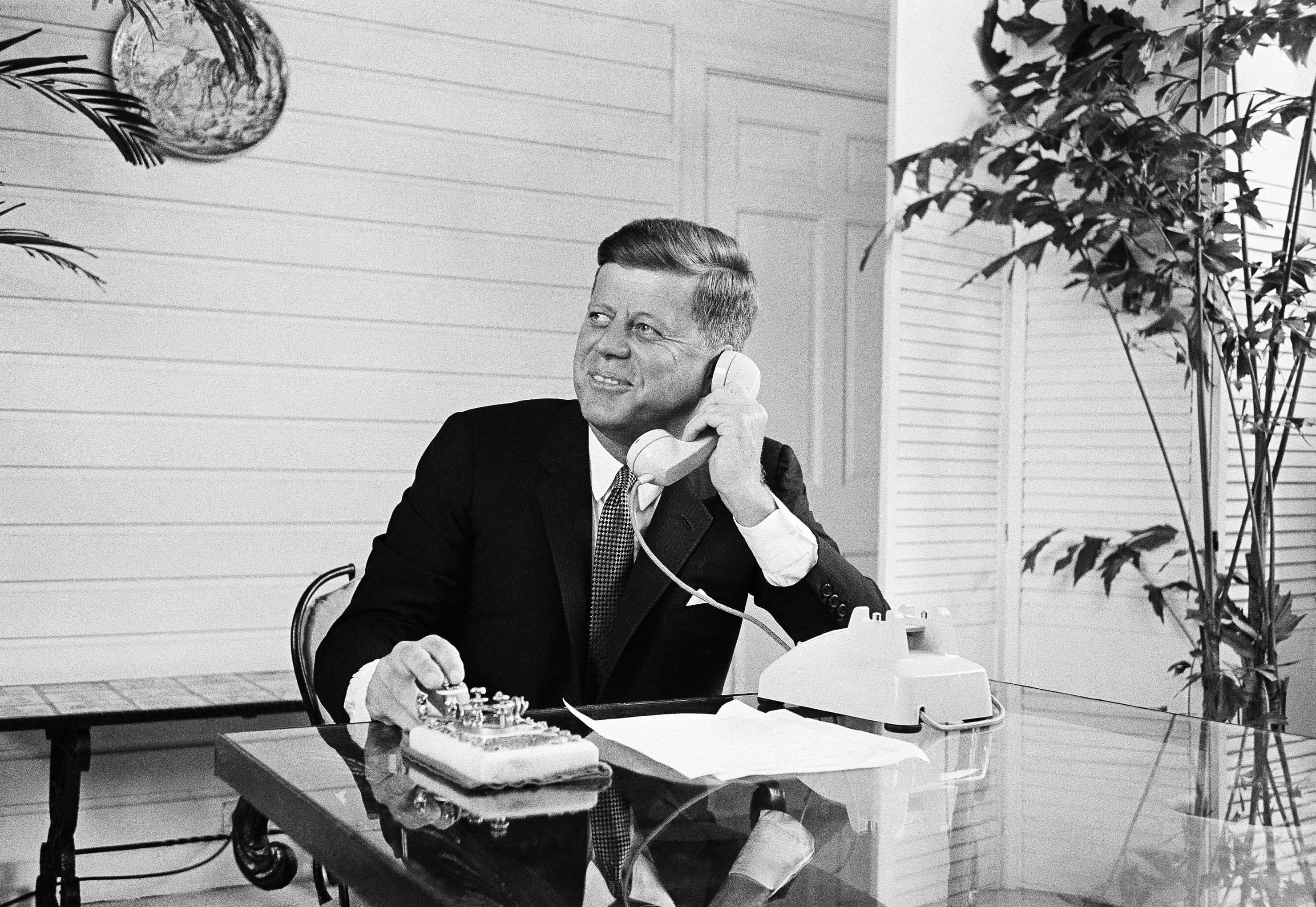 From speeches to quiet family moments, see John F Kennedy's life in