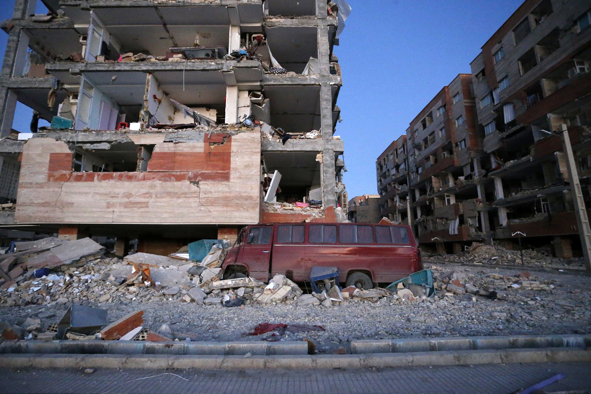 <div class='meta'><div class='origin-logo' data-origin='none'></div><span class='caption-text' data-credit='Pouria Pakizeh/ISNA via AP'>In this photo provided by the ISNA, destroyed buildings and a car are seen after an earthquake at the city of Sarpol-e-Zahab in western Iran, Monday, Nov. 13, 2017.</span></div>