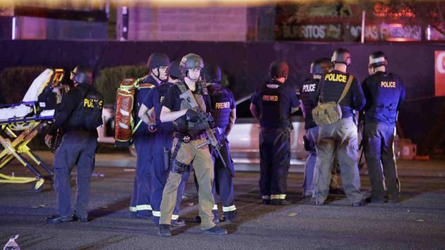 <div class='meta'><div class='origin-logo' data-origin='none'></div><span class='caption-text' data-credit='AP Photo/John Locher'>Police responded to a shooting near the Mandalay Bay resort and casino on the Las Vegas Strip, Sunday, Oct. 1, 2017, in Las Vegas.</span></div>