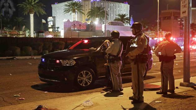 <div class='meta'><div class='origin-logo' data-origin='none'></div><span class='caption-text' data-credit='AP Photo/John Locher'>Police responded to a shooting near the Mandalay Bay resort and casino on the Las Vegas Strip, Sunday, Oct. 1, 2017, in Las Vegas.</span></div>