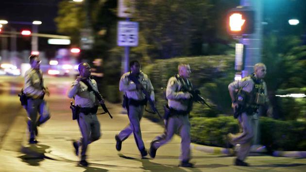 <div class='meta'><div class='origin-logo' data-origin='none'></div><span class='caption-text' data-credit='AP Photo/John Locher'>Police responded to a shooting near the Mandalay Bay resort and casino on the Las Vegas Strip, Sunday, Oct. 1, 2017, in Las Vegas.</span></div>