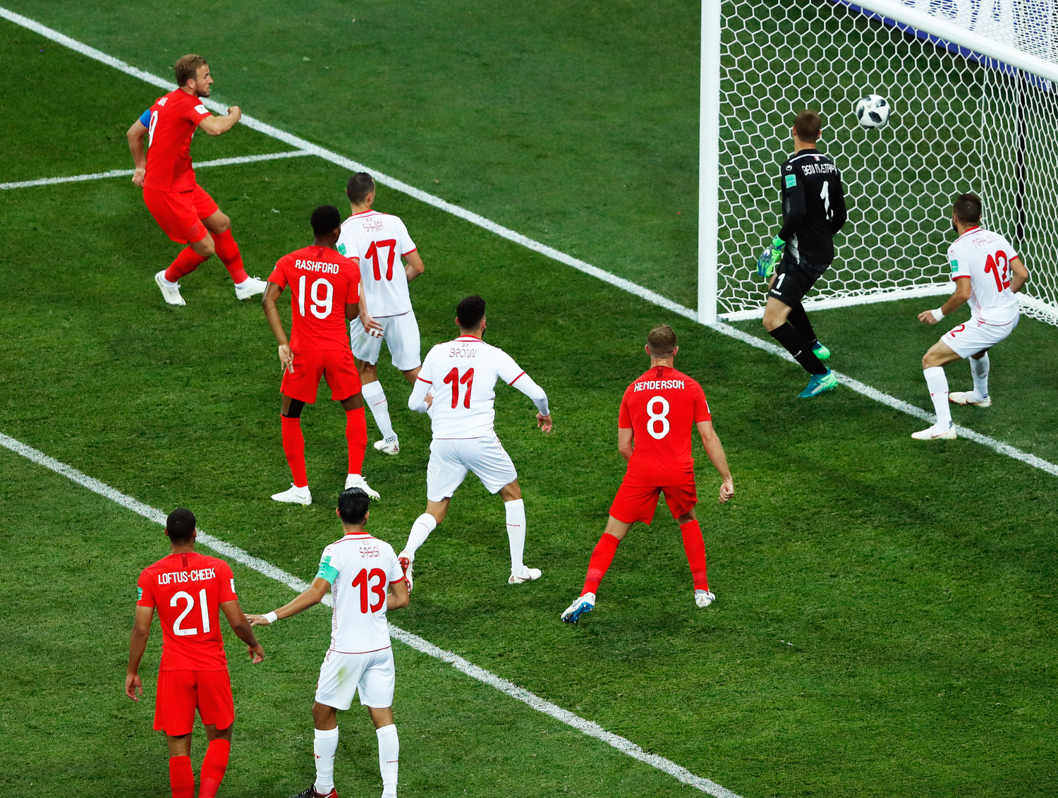 <div class='meta'><div class='origin-logo' data-origin='none'></div><span class='caption-text' data-credit='Rebecca Blackwell/AP Photo'>England's Harry Kane, left, scores his side's winning goal during the group G match between Tunisia and England</span></div>