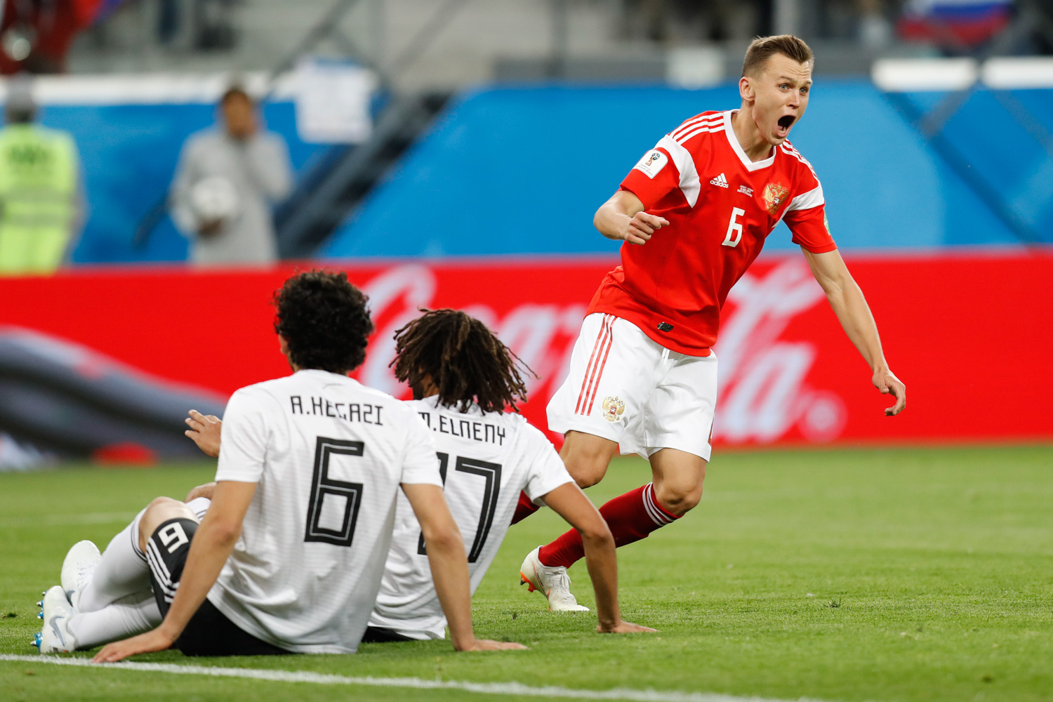 <div class='meta'><div class='origin-logo' data-origin='none'></div><span class='caption-text' data-credit='Efrem Lukatsky/AP'>Russia's Denis Cheryshev celebrates after scoring his team second goal during the group A match between Russia and Egypt at the 2018 soccer World Cup in the St. Petersburg stadium</span></div>