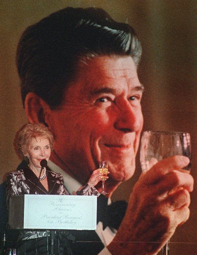 <div class='meta'><div class='origin-logo' data-origin='AP'></div><span class='caption-text' data-credit=''>Former First Lady Nancy Reagan raises her glass in front of a portrait of Ronald Reagan during her husband Former President Ronald Reagan's 85th birthday celebration</span></div>
