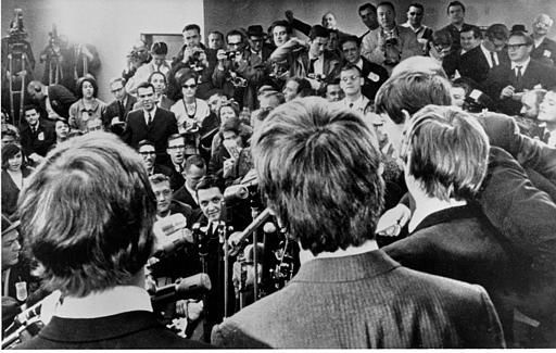 The Beatles face the media on arrival at JFK airport on Feb. 7, 1964. They were also greeted by a screaming crowd estimated at 5,000. <span class=meta>AP Photo</span>