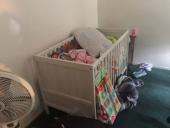 <div class='meta'><div class='origin-logo' data-origin='none'></div><span class='caption-text' data-credit=''>A crib filled with clothes and toys is found inside one of the rooms of a Redlands home connect to the San Bernardino shooting suspects.</span></div>
