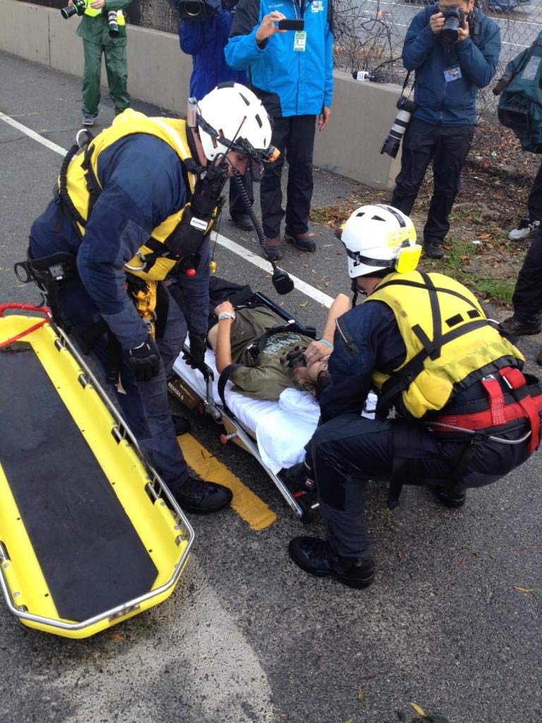Reporter Rob Hayes shows LAFD swift-water-rescue team members preparing a woman to go to the hospital after being rescued from the Los Angeles River on Friday, Dec. 12, 2014. <span class=meta>Rob Hayes, ABC7</span>