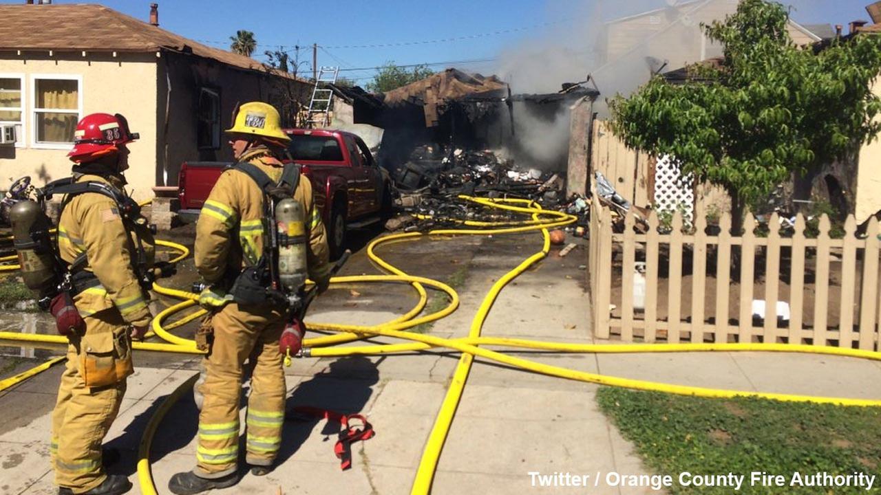 3 people, including officer, injured in Placentia garage fire