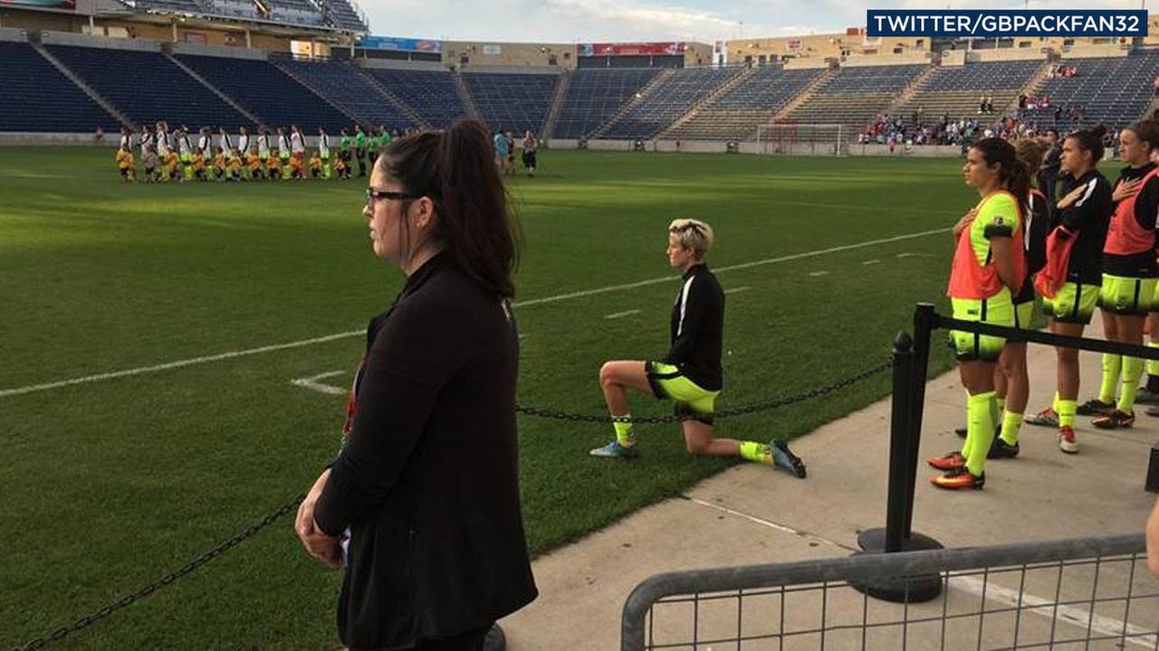 Soccer star Megan Rapinoe kneels during national anthem