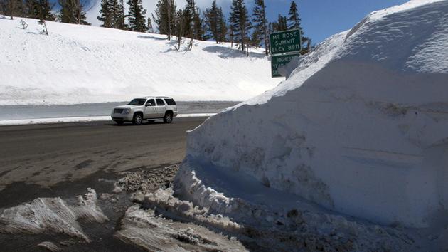 This photograph taken Sunday, March 26, 2017 shows the record snow piled at the summit of the Mount Rose Highway near the Mt. Rose ski resort half way between Reno and Lake Tahoe.