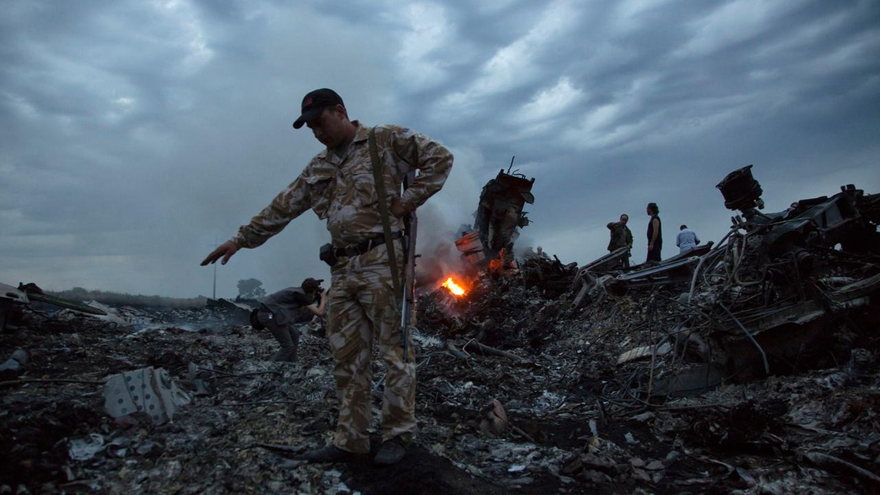 PHOTOS Malaysia Airlines Flight MH17 crash site  KABC7 Photos and
