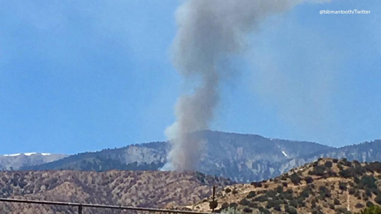 Firefighters work to get fire near Wrightwood neighborhood under control
