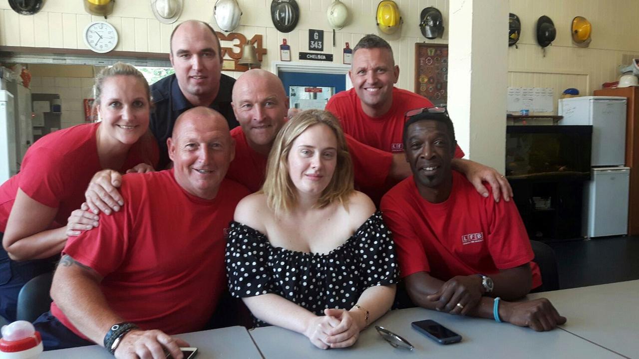 Adele visits London firefighters after deadly tower blaze