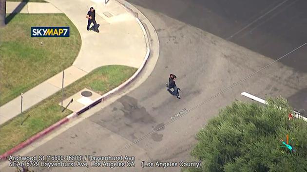 An off-duty reserve police officer helped with the foot pursuit of a suspect after a high-speed chase in Van Nuys on Wednesday, July 19, 2017.
