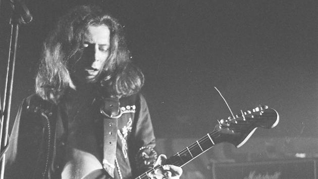Fast Eddie Clarke from the UK band Motorhead performs on stage at the Electric Circus on Jan. 1, 1977.