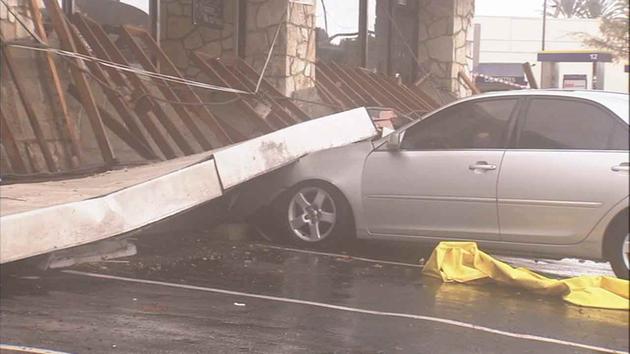 A second-story balcony collapsed from the pounding rain and powerful winds at an apartment complex in Long Beach on Friday, Dec. 12, 2014. <span class=meta></span>