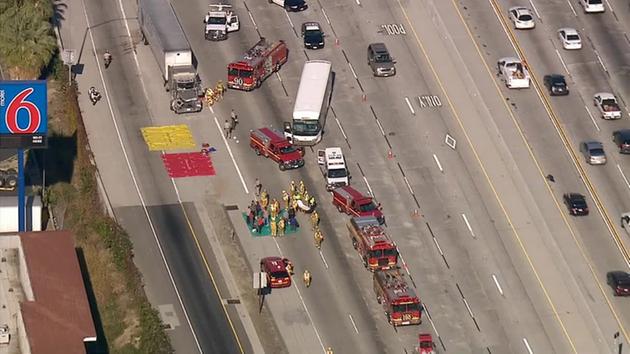 A charter bus crashed into a semi-truck on the eastbound 60 Freeway near 7th Avenue in Hacienda Heights on Wednesday, Jan. 7, 2015. <span class=meta></span>